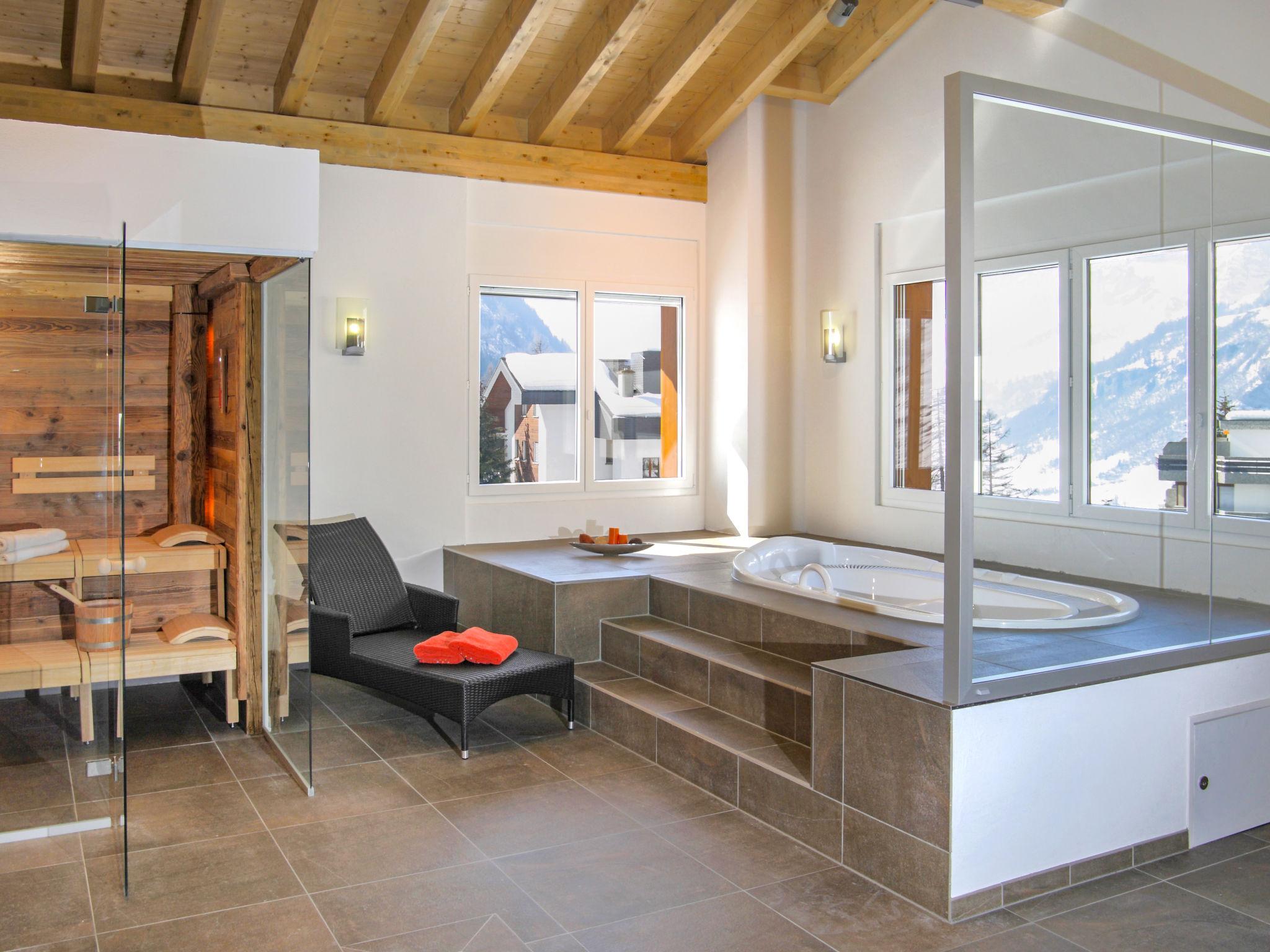 Foto 5 - Appartamento con 4 camere da letto a Leukerbad con sauna e vasca idromassaggio