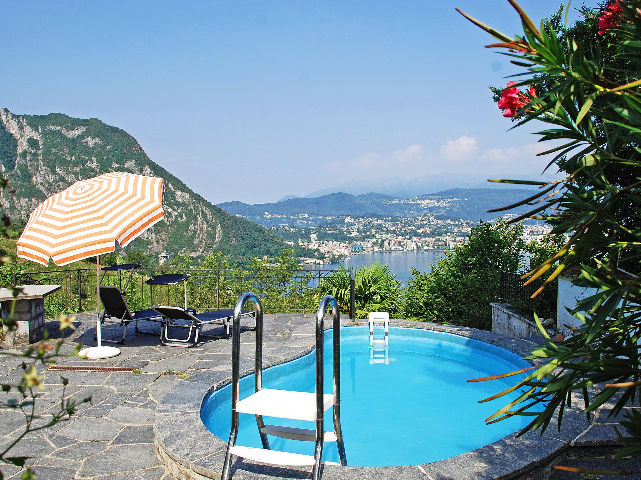 Foto 1 - Casa con 3 camere da letto a Lugano con piscina privata e giardino