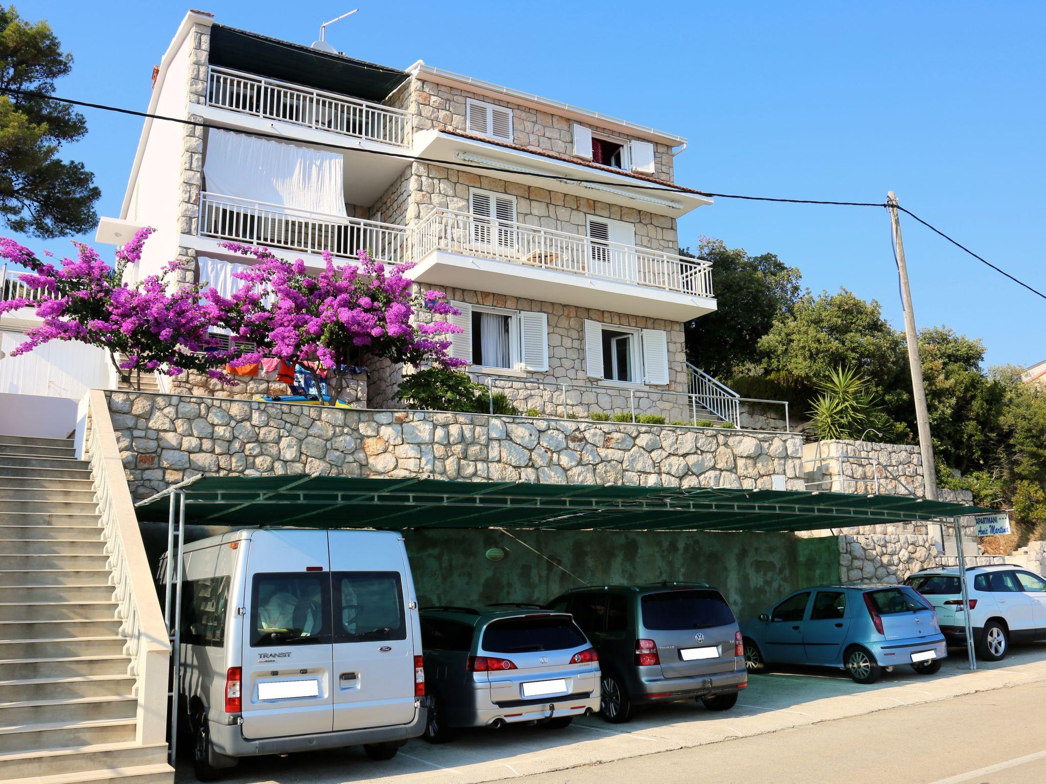 Foto 5 - Apartamento de 4 habitaciones en Blato con vistas al mar