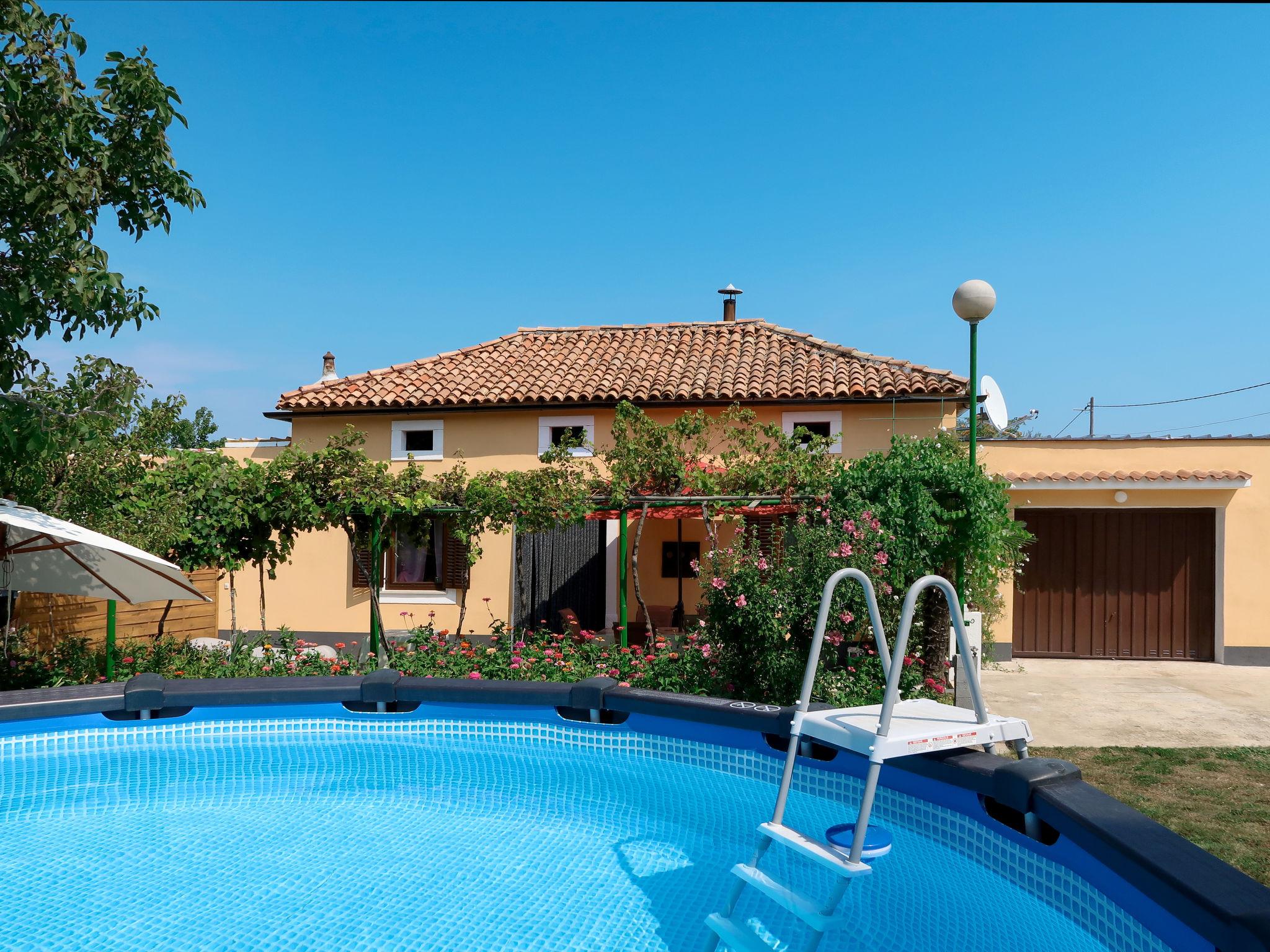 Photo 1 - Maison de 2 chambres à Marčana avec piscine privée et vues à la mer