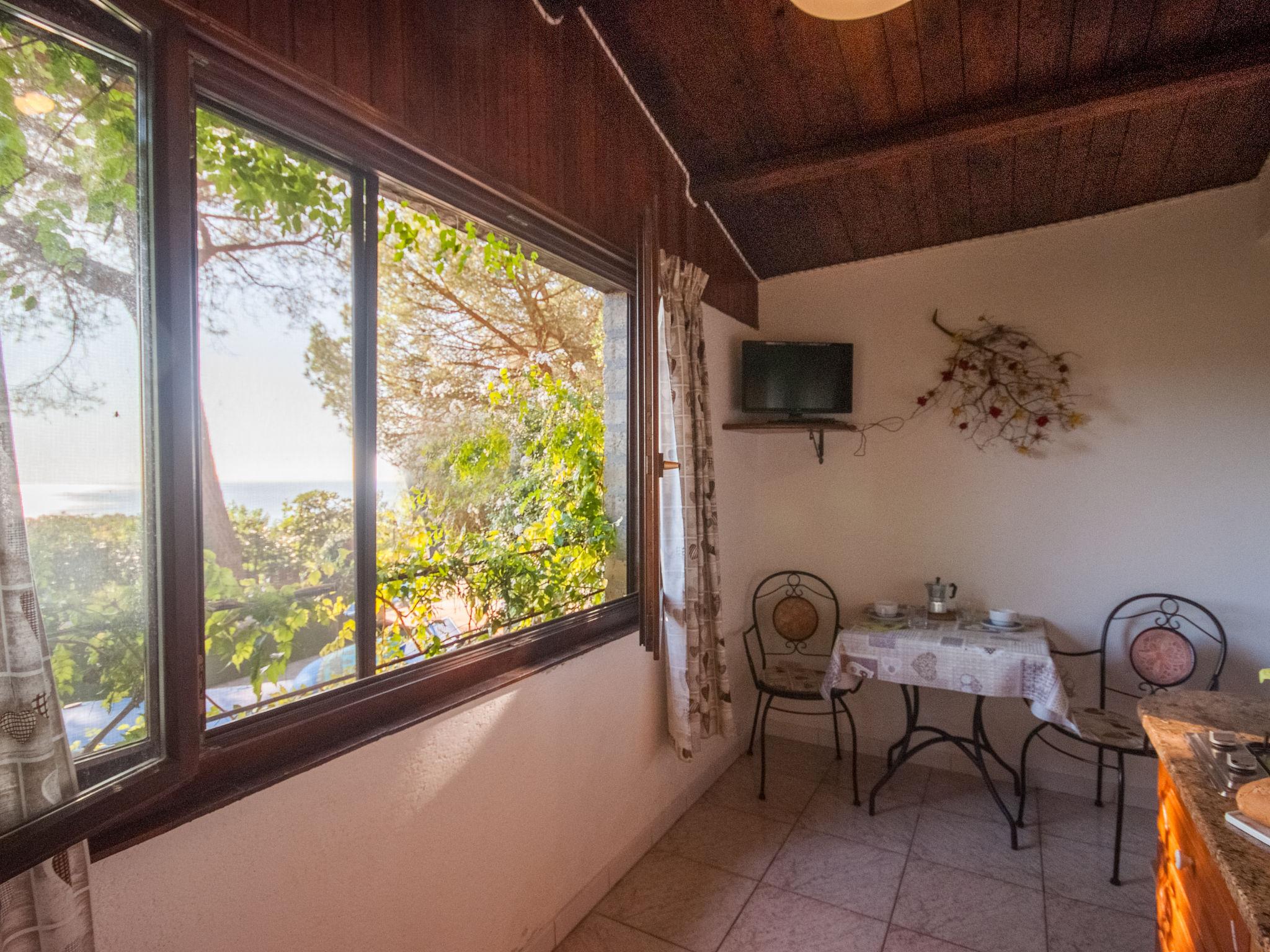 Foto 5 - Casa de 1 habitación en Capoliveri con jardín y vistas al mar