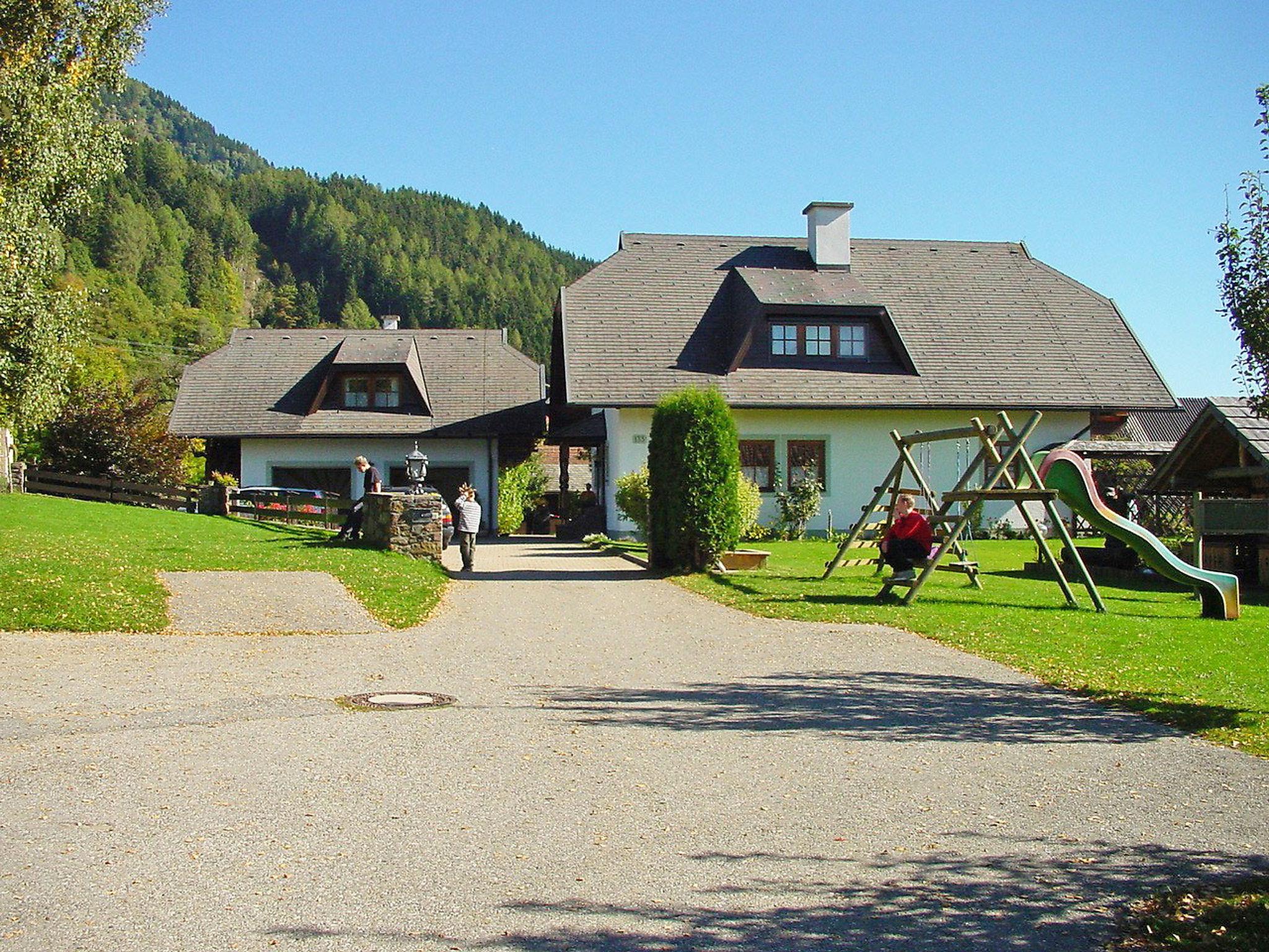 Foto 1 - Appartamento con 2 camere da letto a Seeboden am Millstätter See con giardino e vista sulle montagne