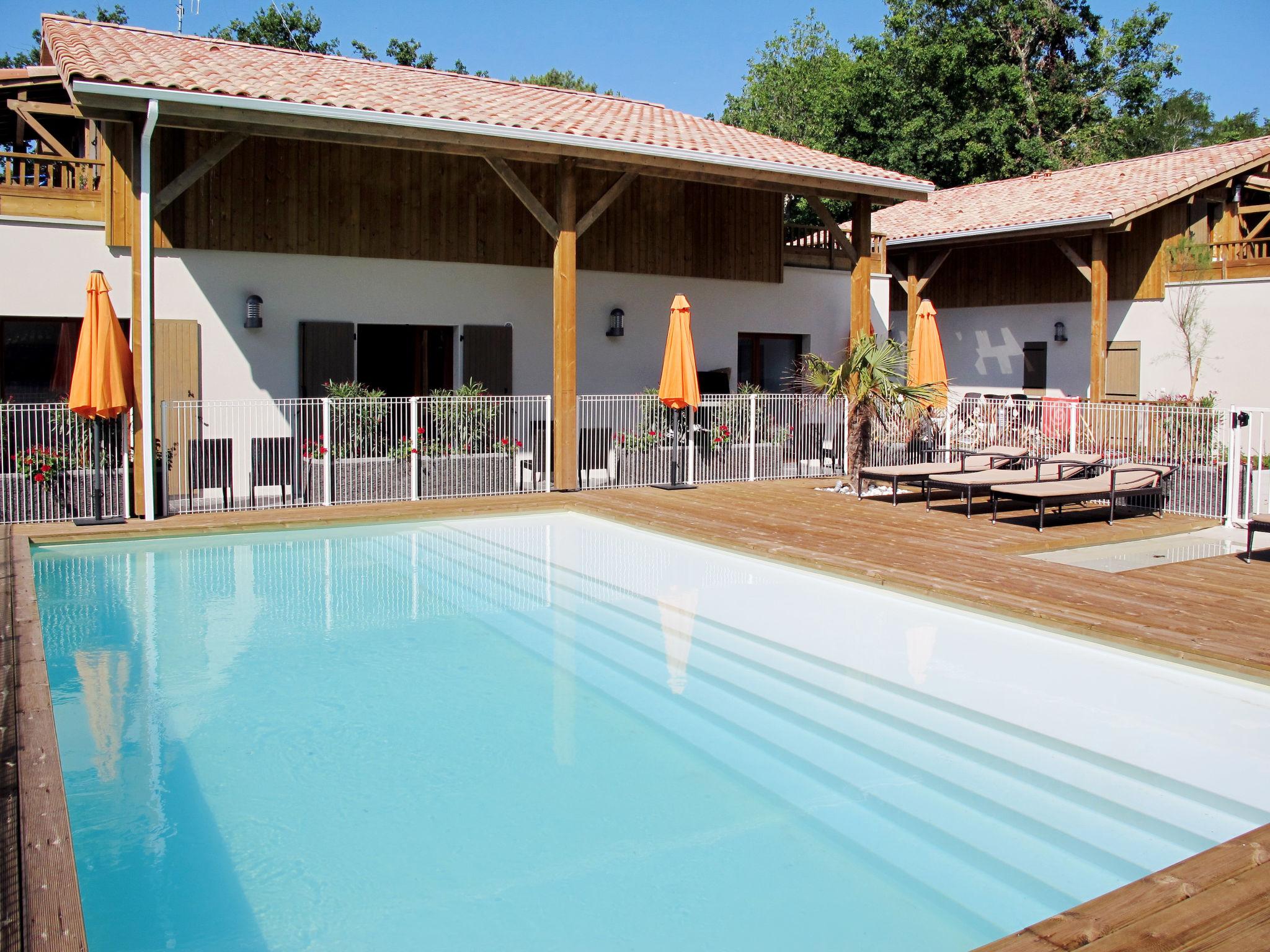 Photo 1 - Appartement de 2 chambres à Lacanau avec piscine et vues à la mer