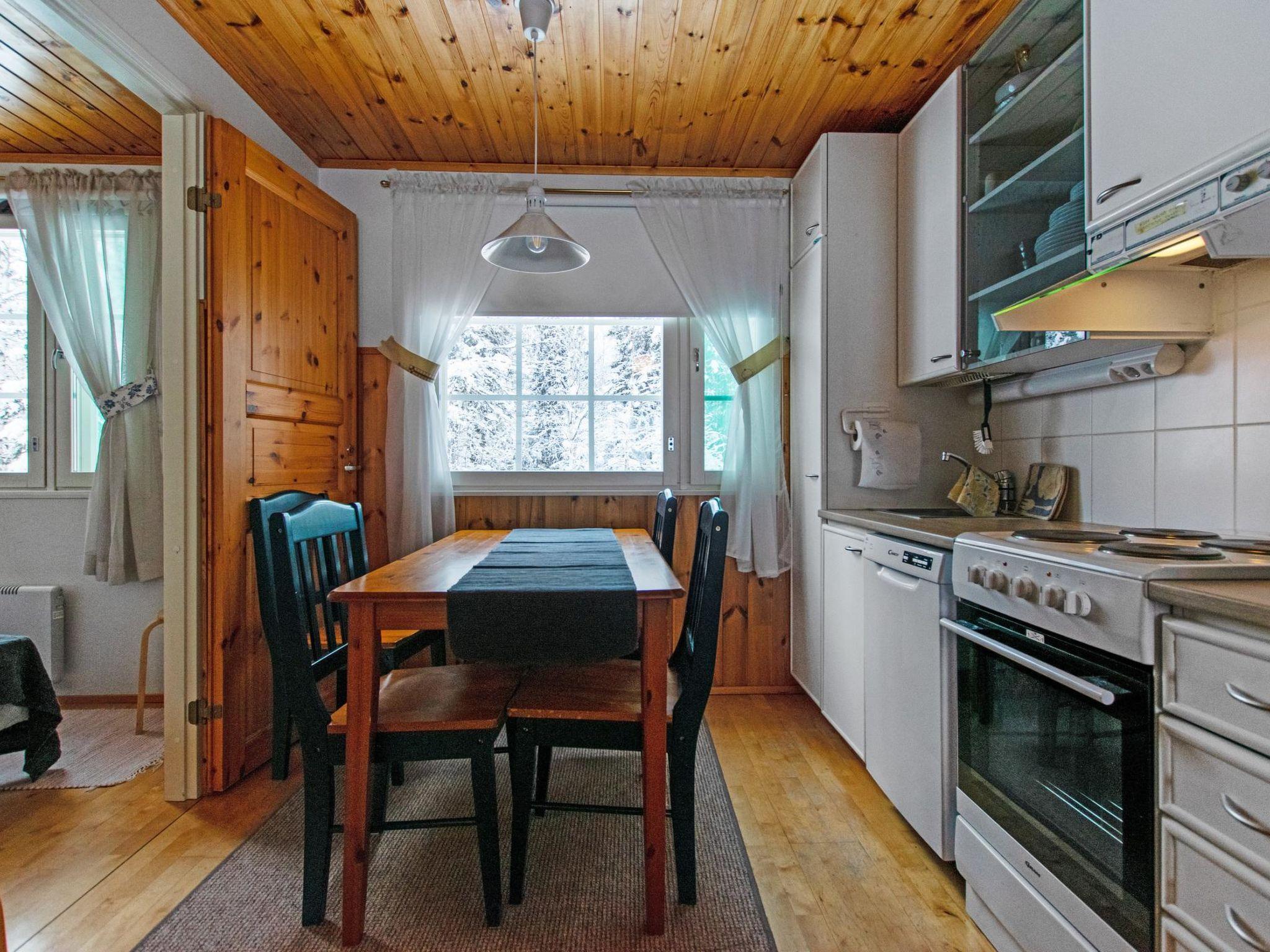 Foto 5 - Haus mit 1 Schlafzimmer in Puolanka mit sauna und blick auf die berge