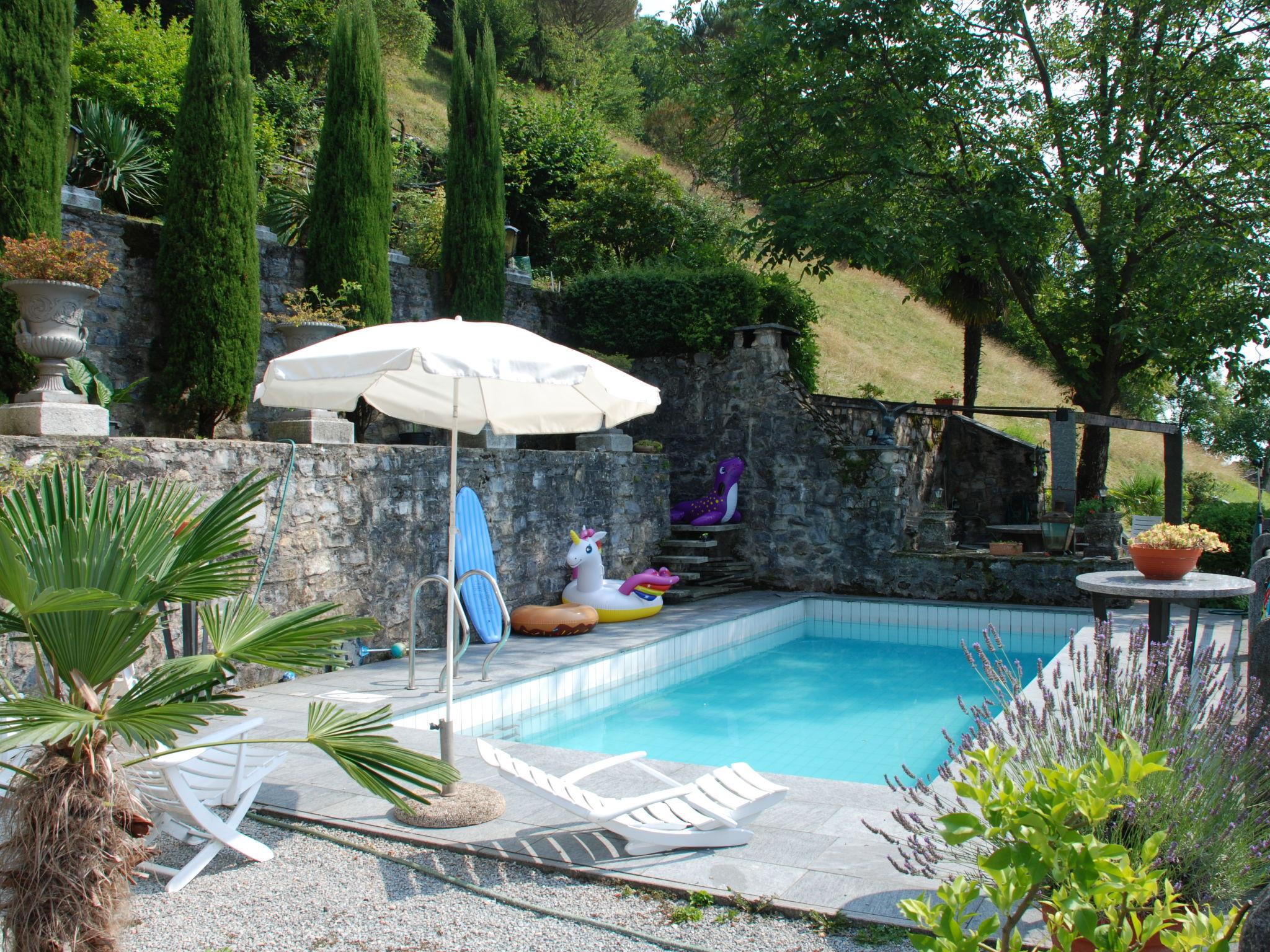 Photo 1 - Maison de 3 chambres à Breggia avec piscine privée et vues sur la montagne