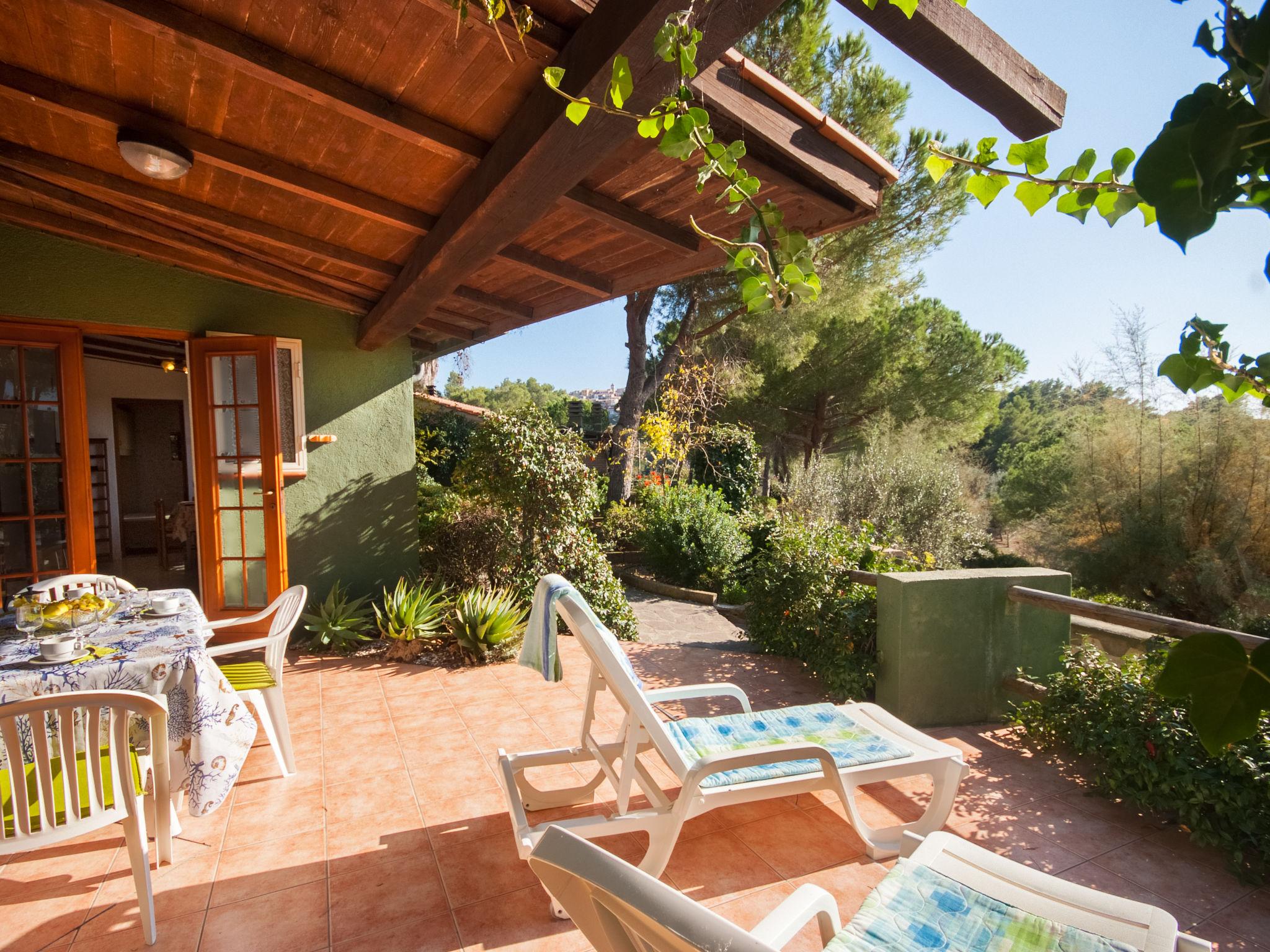 Photo 17 - Maison de 2 chambres à Capoliveri avec jardin et vues à la mer