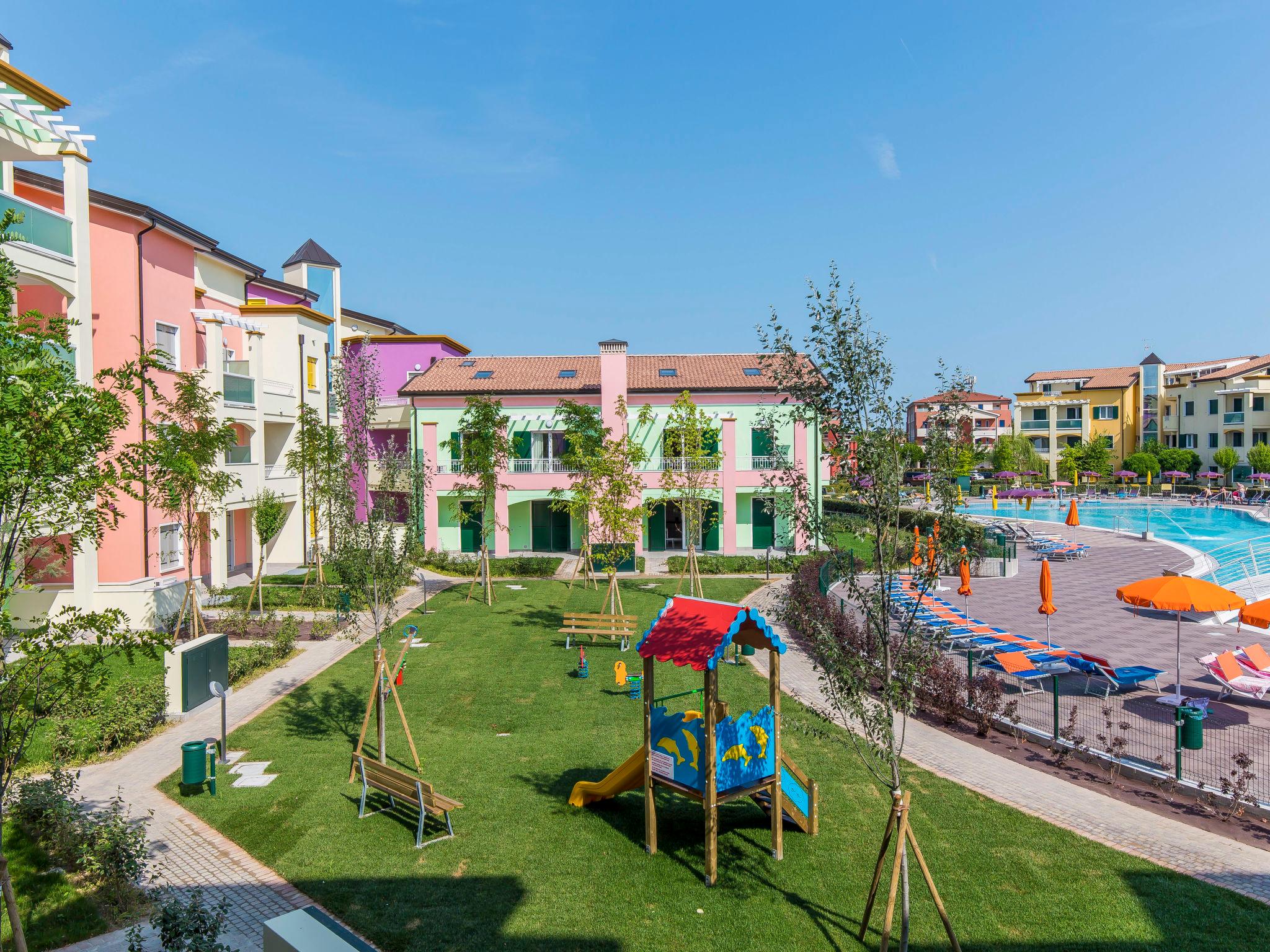 Photo 2 - Appartement de 2 chambres à Caorle avec piscine et vues à la mer