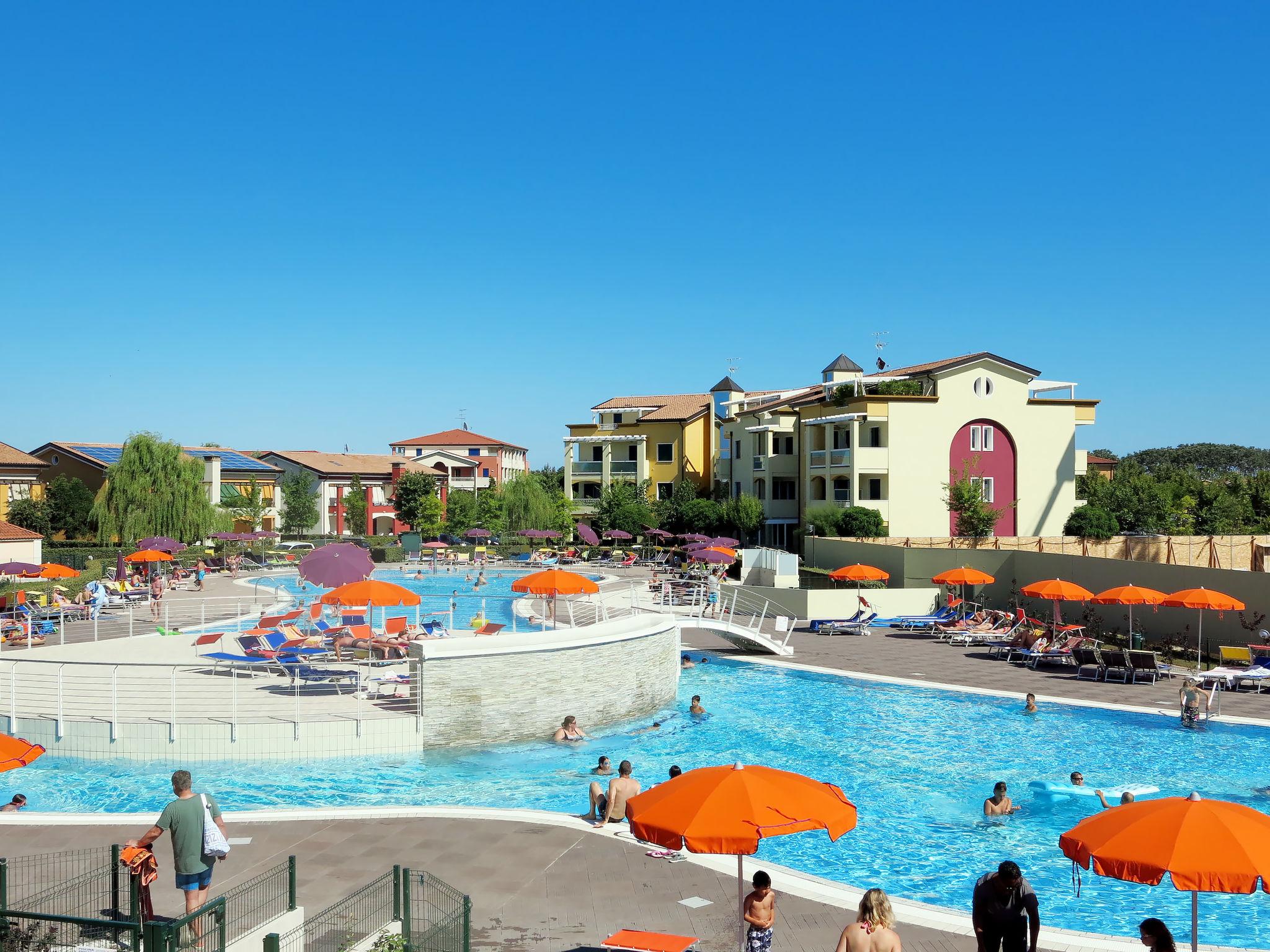 Photo 3 - Appartement de 1 chambre à Caorle avec piscine et vues à la mer