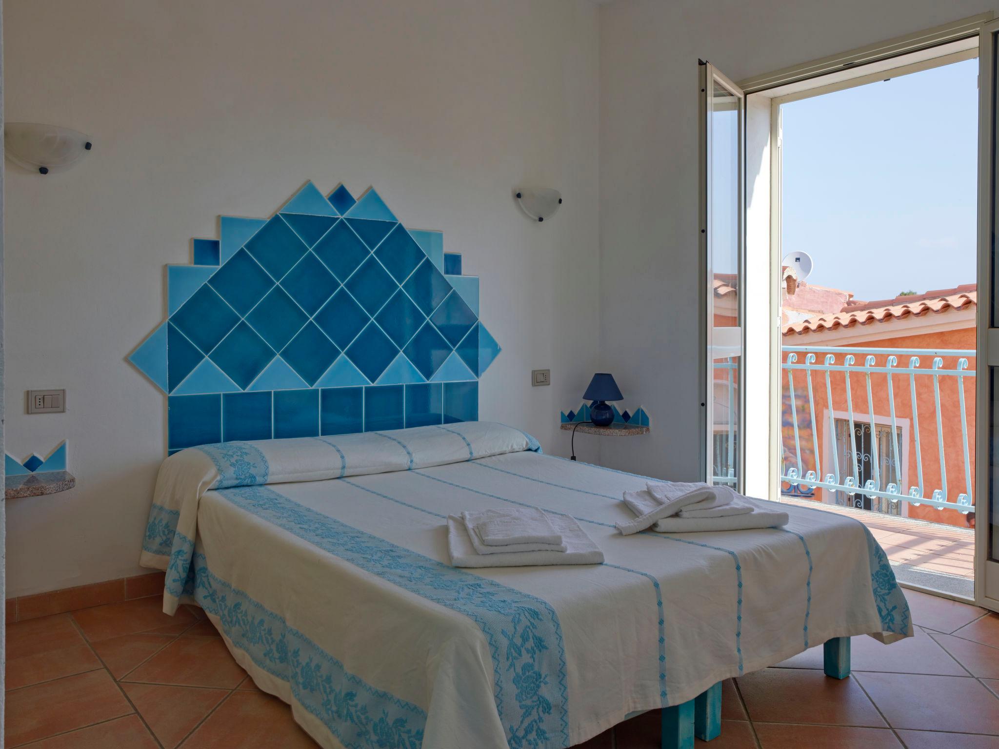 Foto 5 - Appartamento con 2 camere da letto a San Teodoro con piscina e vista mare