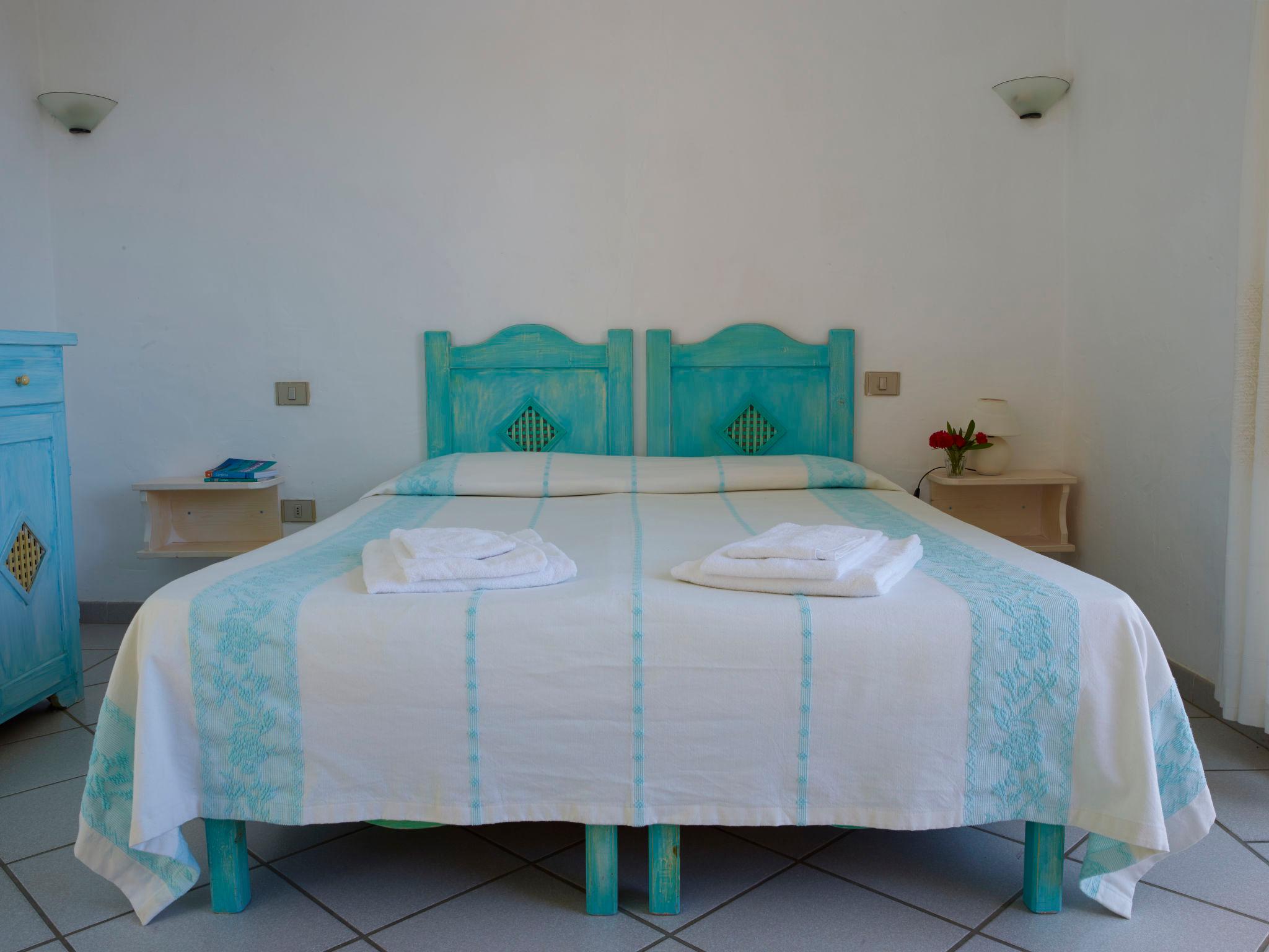 Foto 7 - Apartamento de 2 quartos em San Teodoro com piscina e jardim