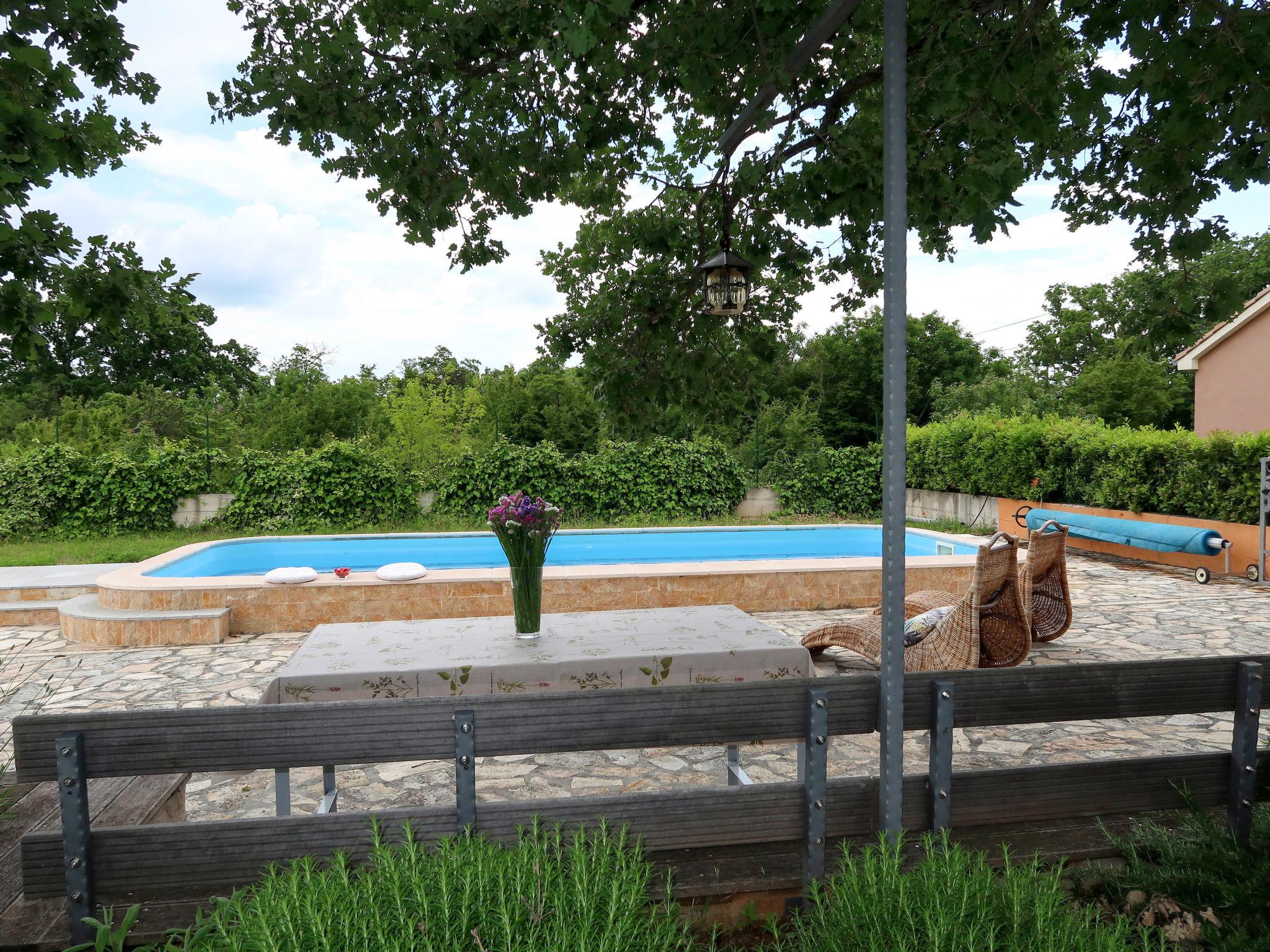 Photo 1 - Maison de 2 chambres à Drniš avec piscine privée et jardin