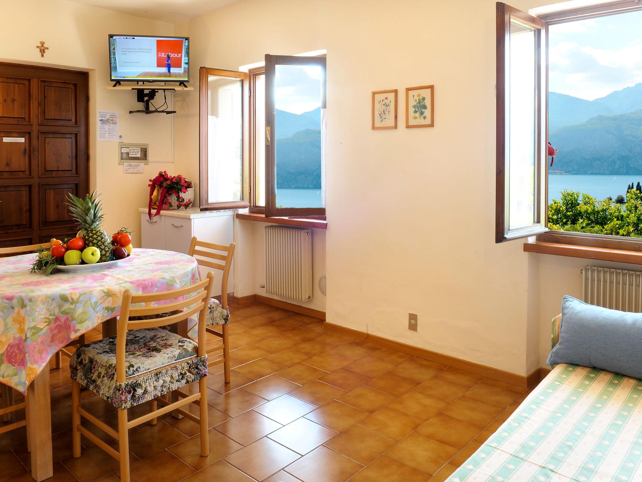 Foto 4 - Apartamento de 1 habitación en Malcesine con jardín y vistas a la montaña