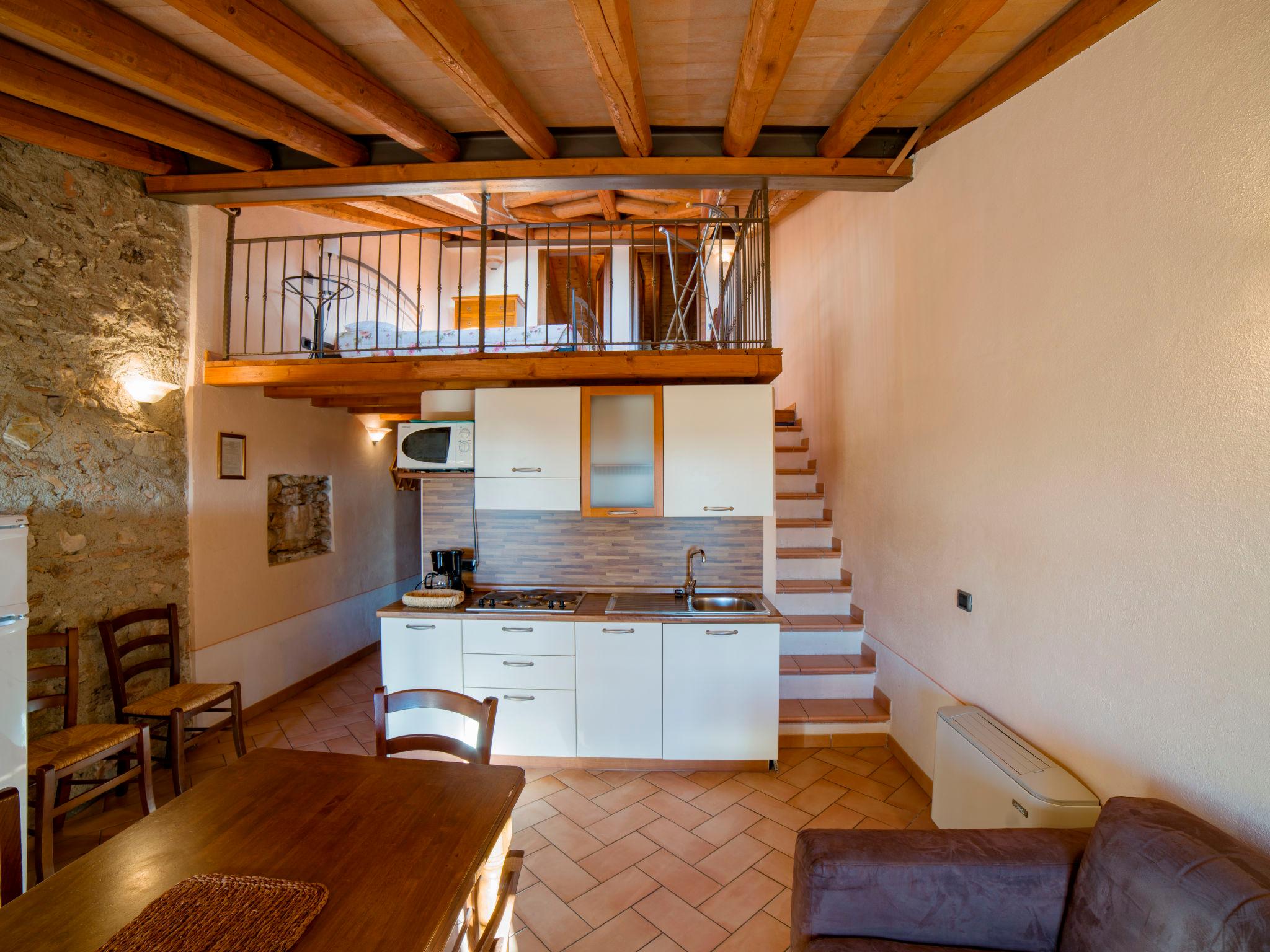 Photo 9 - Appartement de 2 chambres à Toscolano Maderno avec piscine et vues sur la montagne