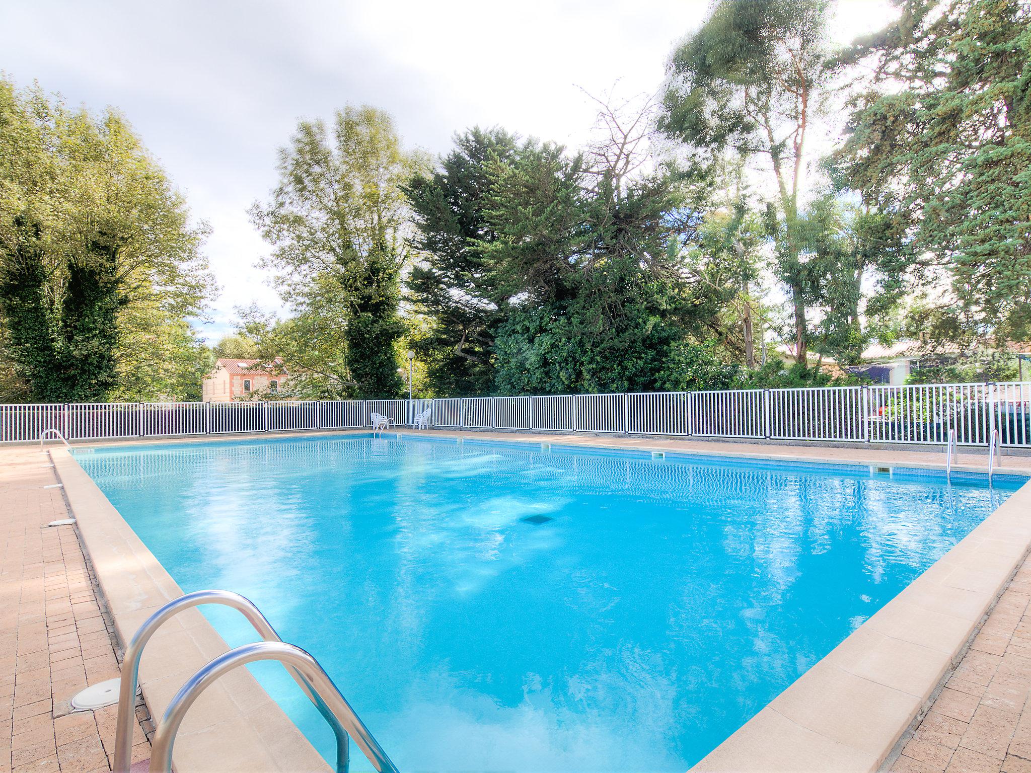 Photo 1 - Appartement de 2 chambres à Saint-Cyprien avec piscine et vues à la mer