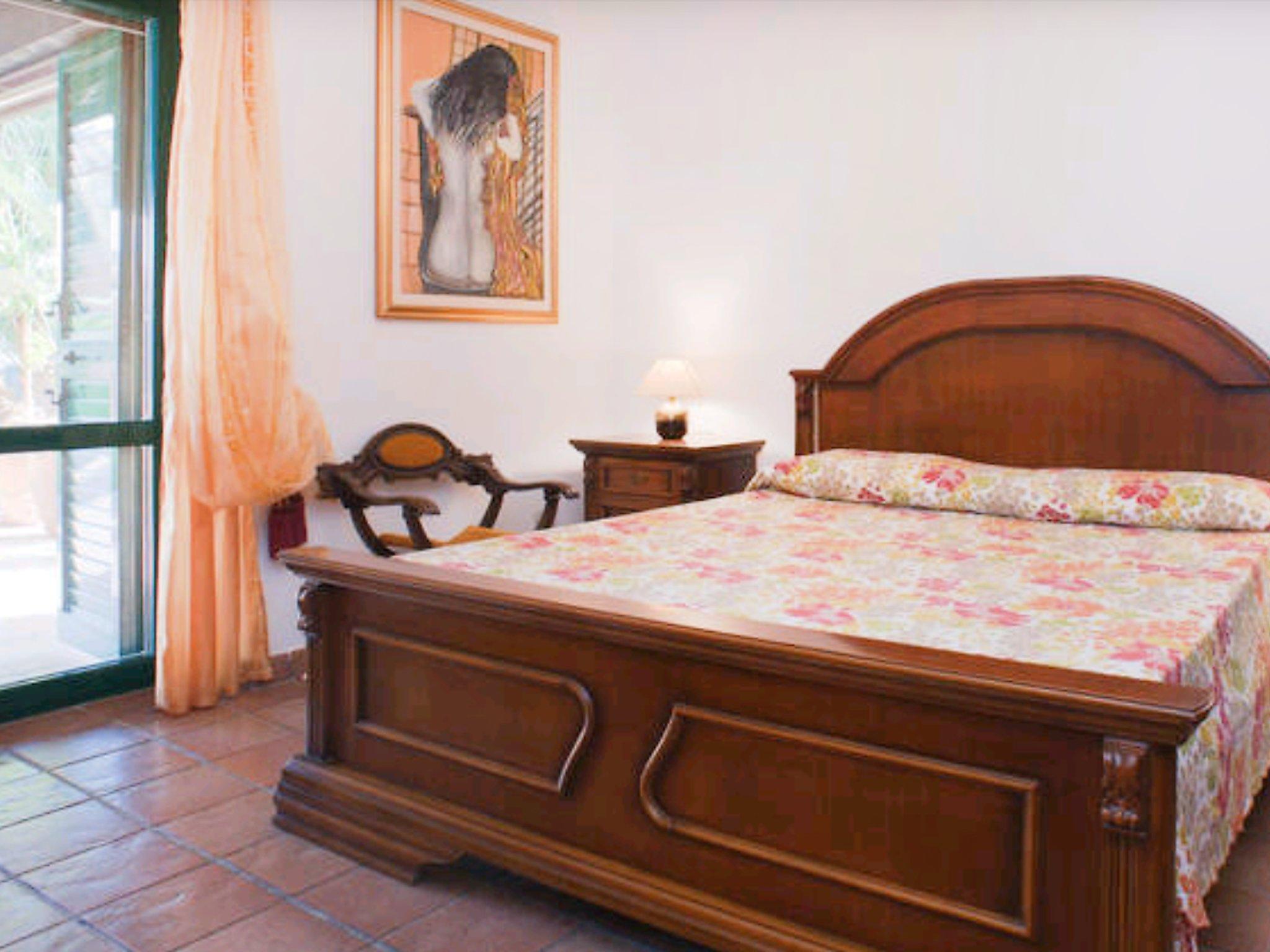 Foto 8 - Appartamento con 2 camere da letto a Quartu Sant'Elena con giardino