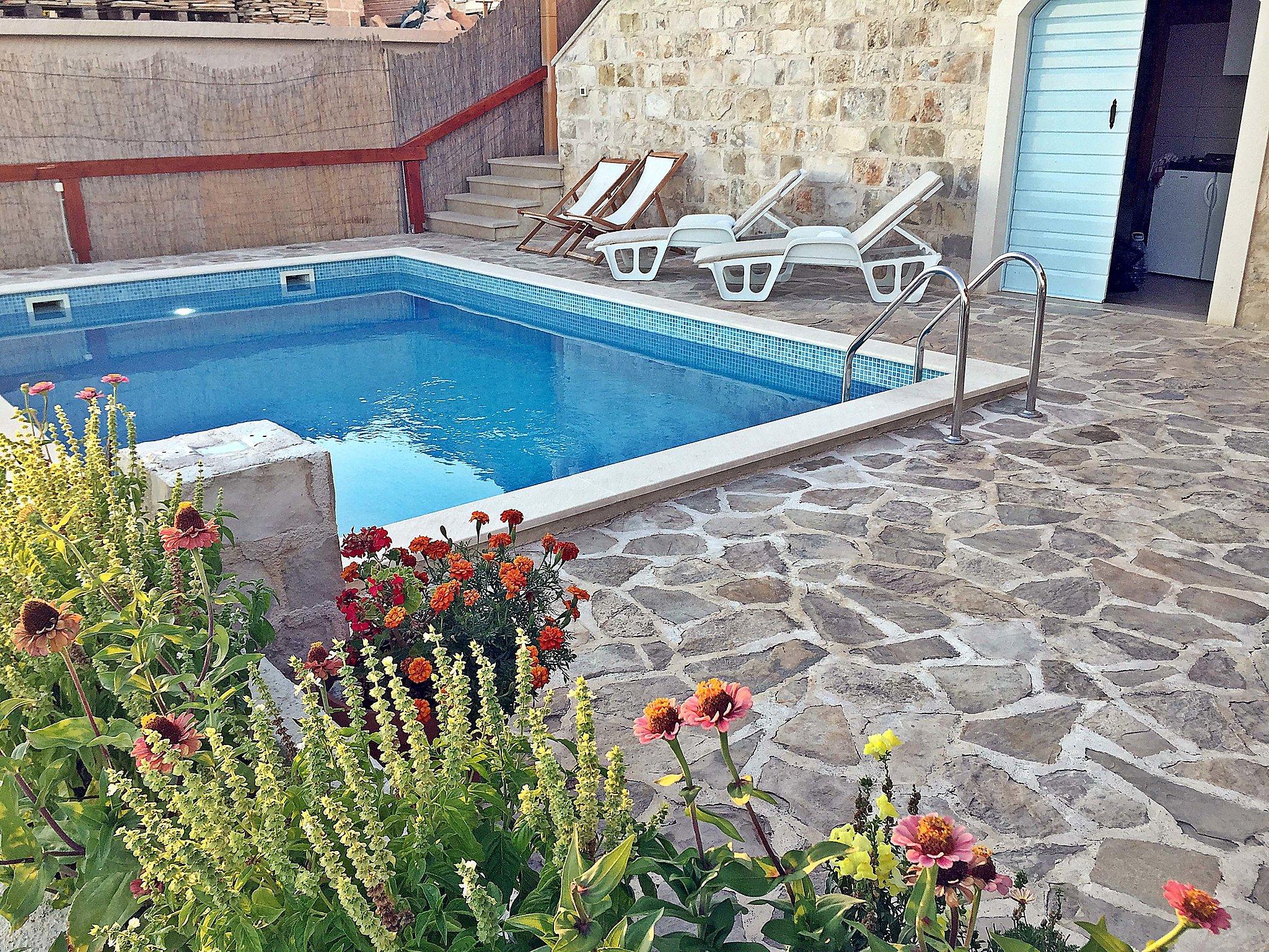 Foto 24 - Casa con 2 camere da letto a Dugi Rat con piscina privata e giardino