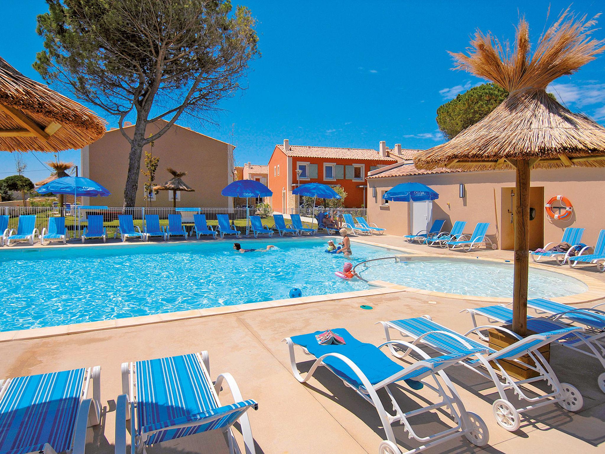Photo 1 - Maison de 1 chambre à Aigues-Mortes avec piscine et vues à la mer
