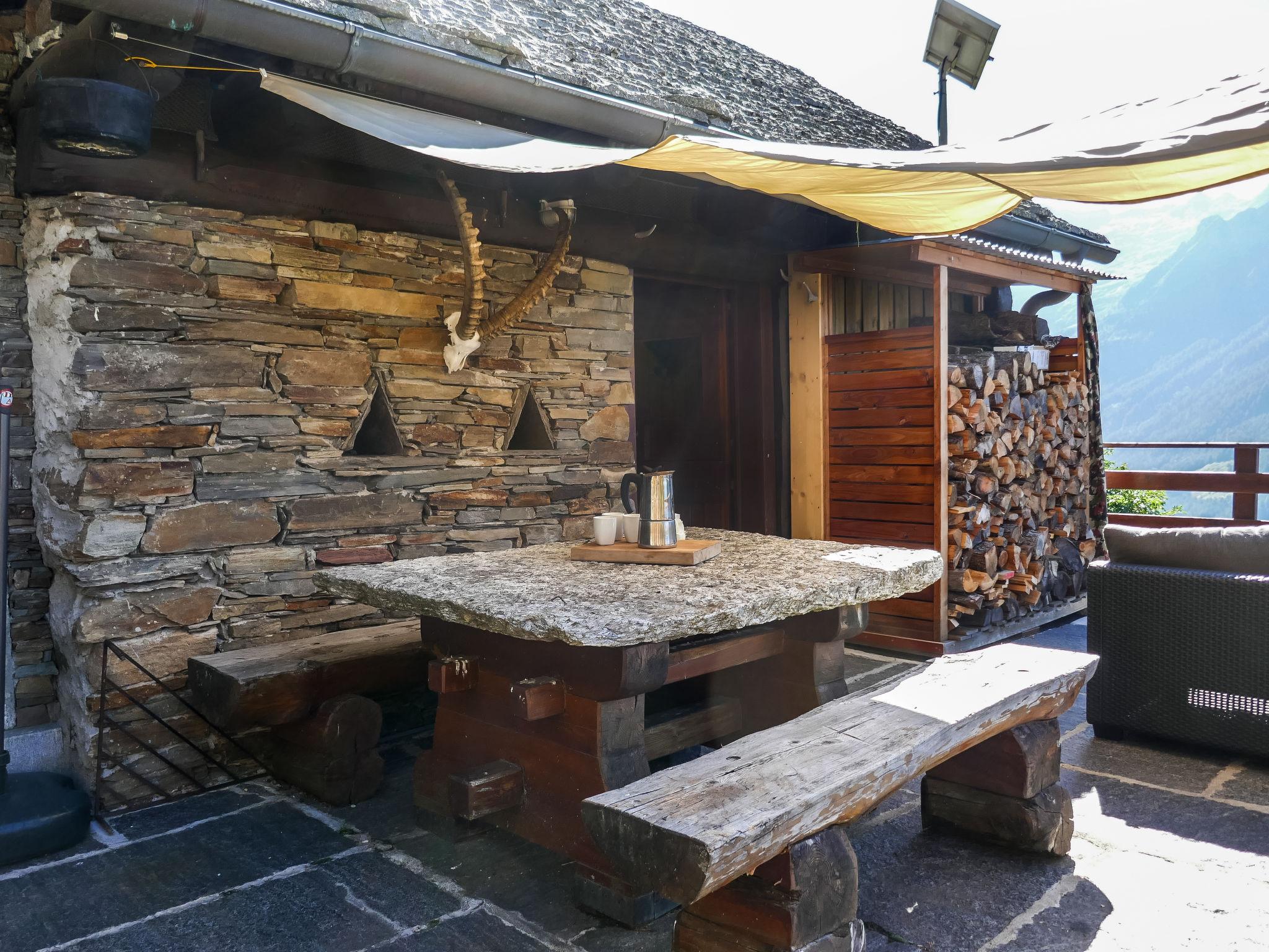 Foto 5 - Haus mit 2 Schlafzimmern in Serravalle mit garten und blick auf die berge