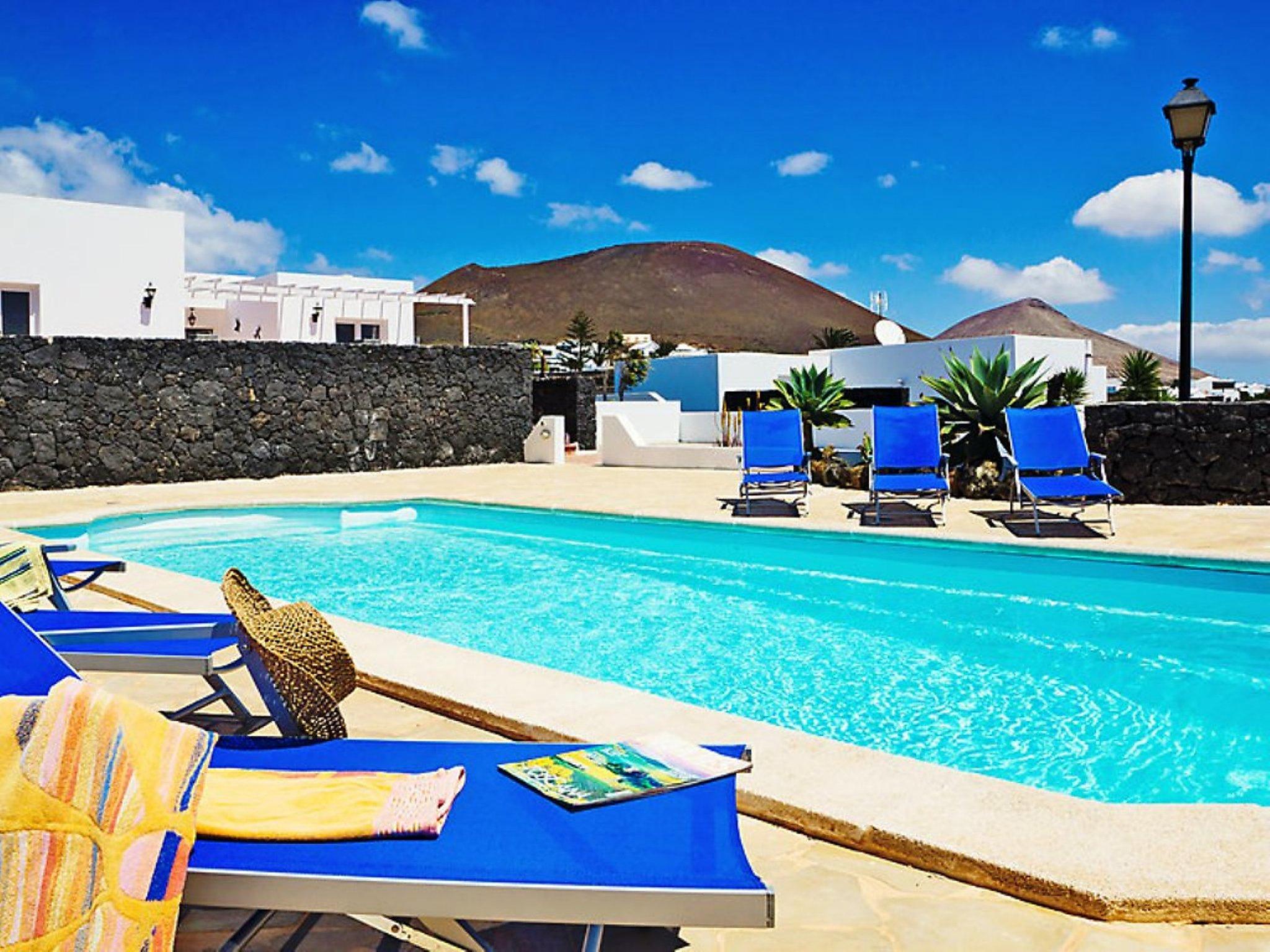 Photo 1 - Maison de 3 chambres à Tías avec piscine privée et vues à la mer