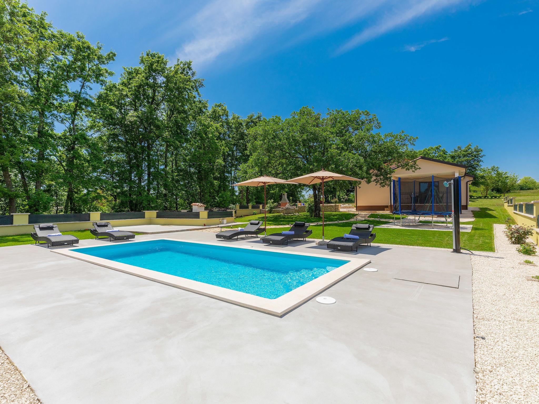 Photo 23 - Maison de 3 chambres à Žminj avec piscine privée et vues à la mer