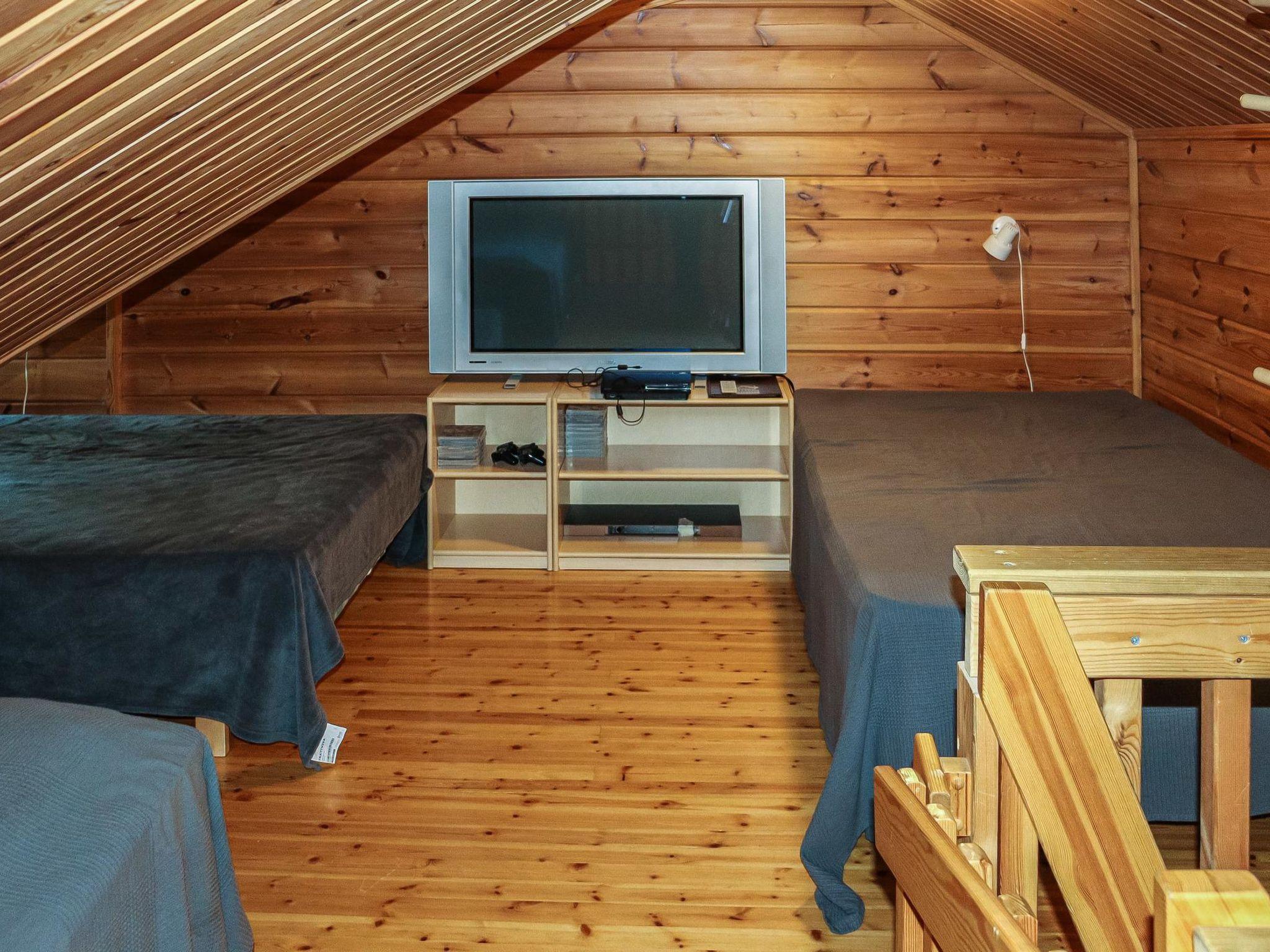 Foto 9 - Casa de 1 habitación en Puolanka con sauna y vistas a la montaña