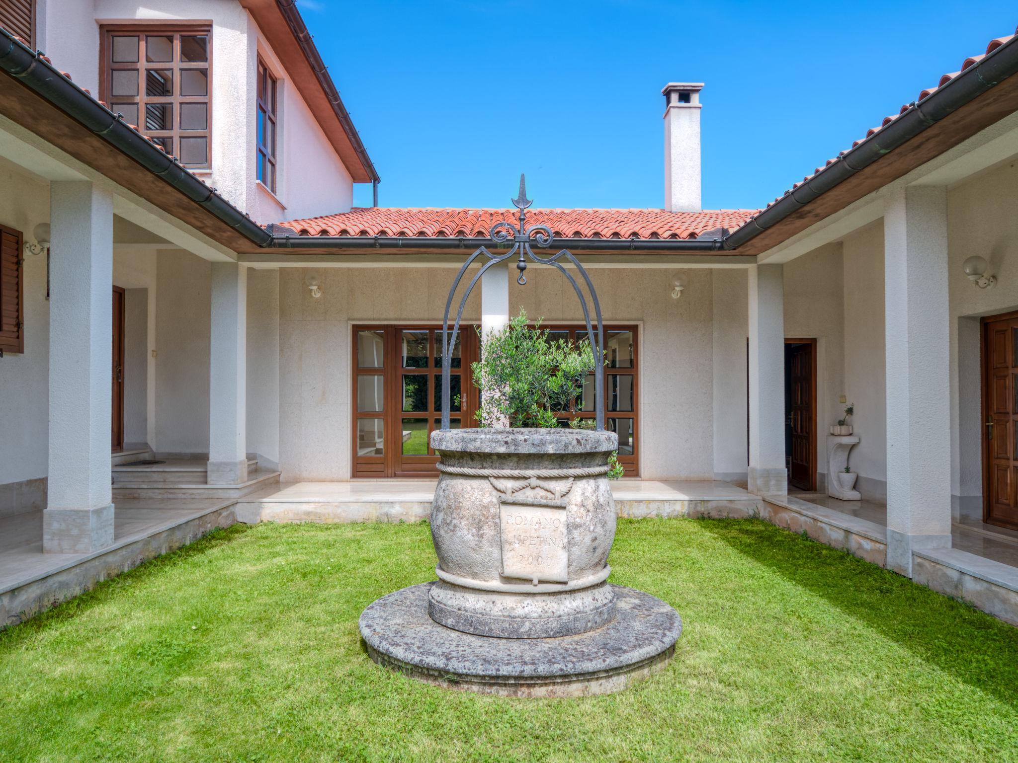 Foto 5 - Casa con 2 camere da letto a Marčana con giardino e terrazza