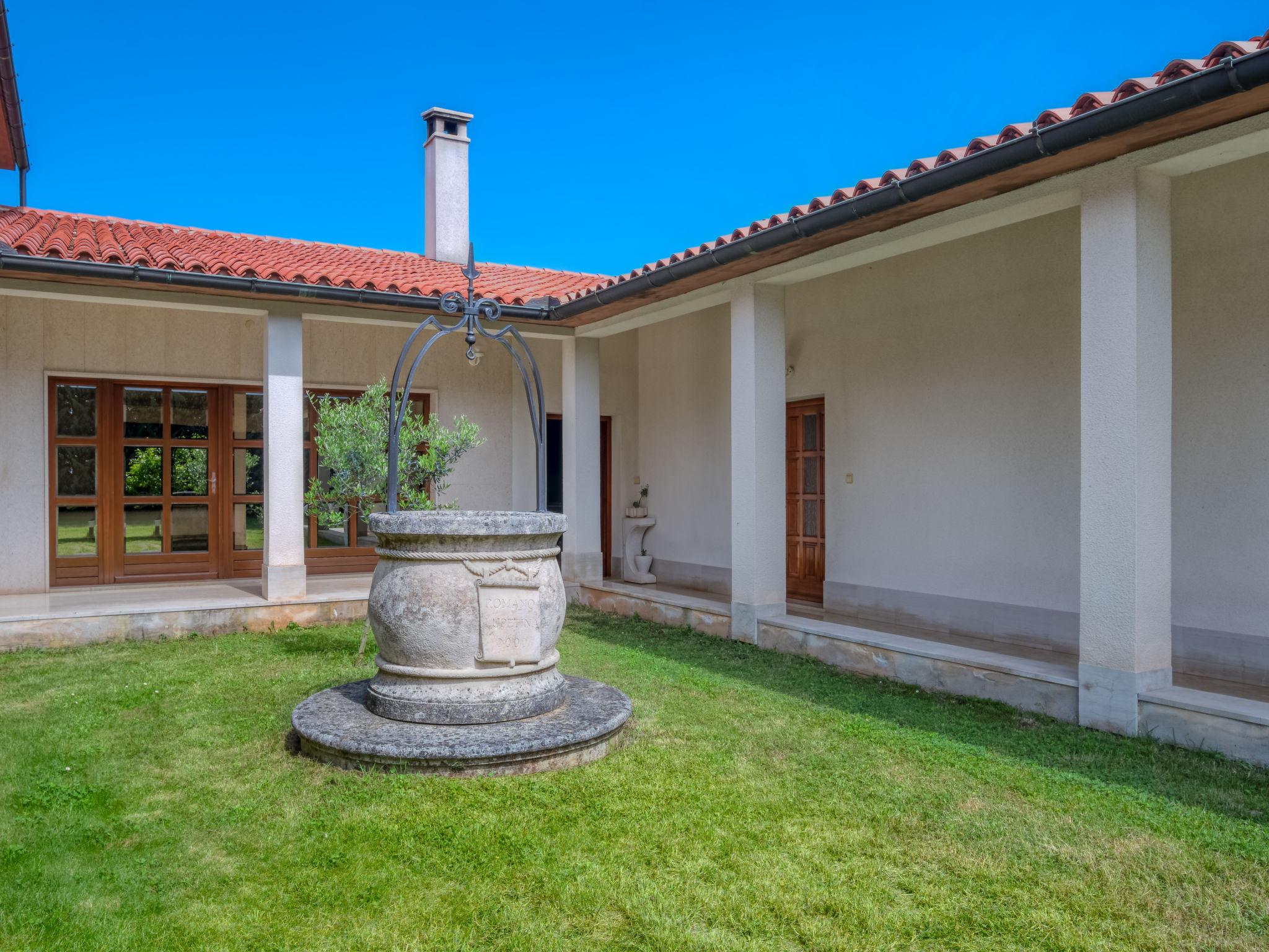 Photo 12 - Maison de 2 chambres à Marčana avec jardin et vues à la mer