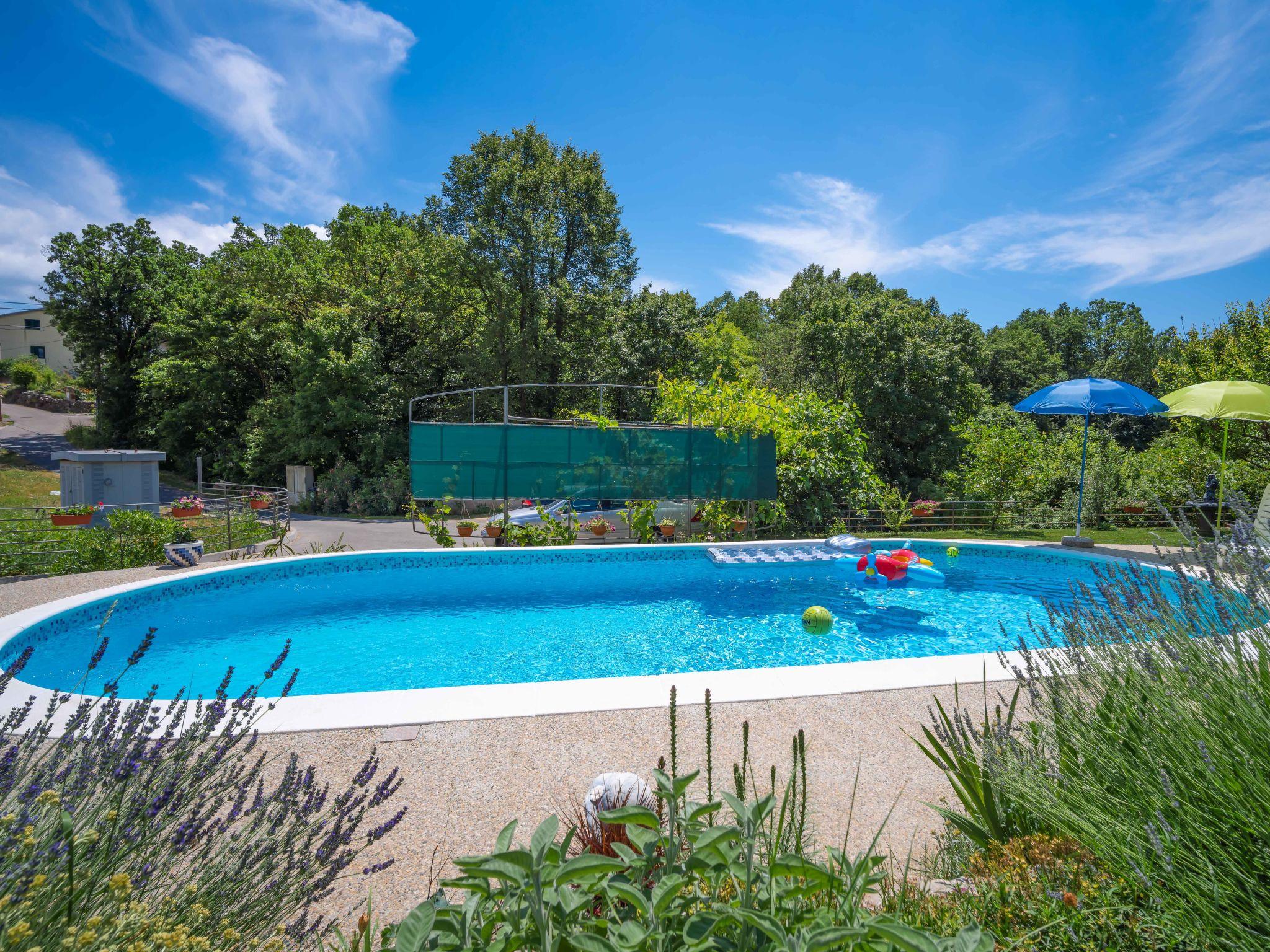 Foto 25 - Casa con 4 camere da letto a Matulji con piscina privata e giardino