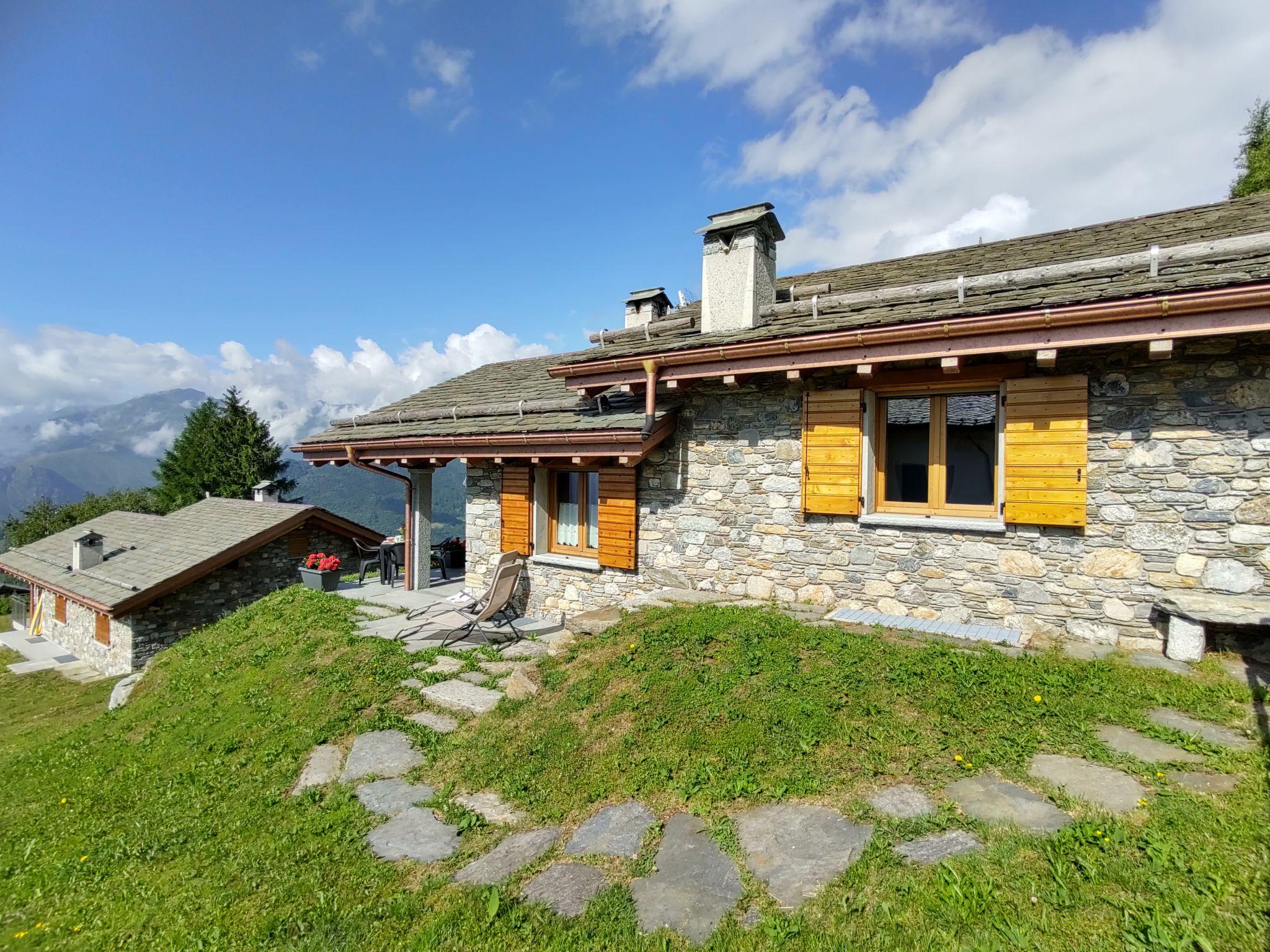 Photo 22 - Maison de 2 chambres à Peglio avec jardin et vues sur la montagne