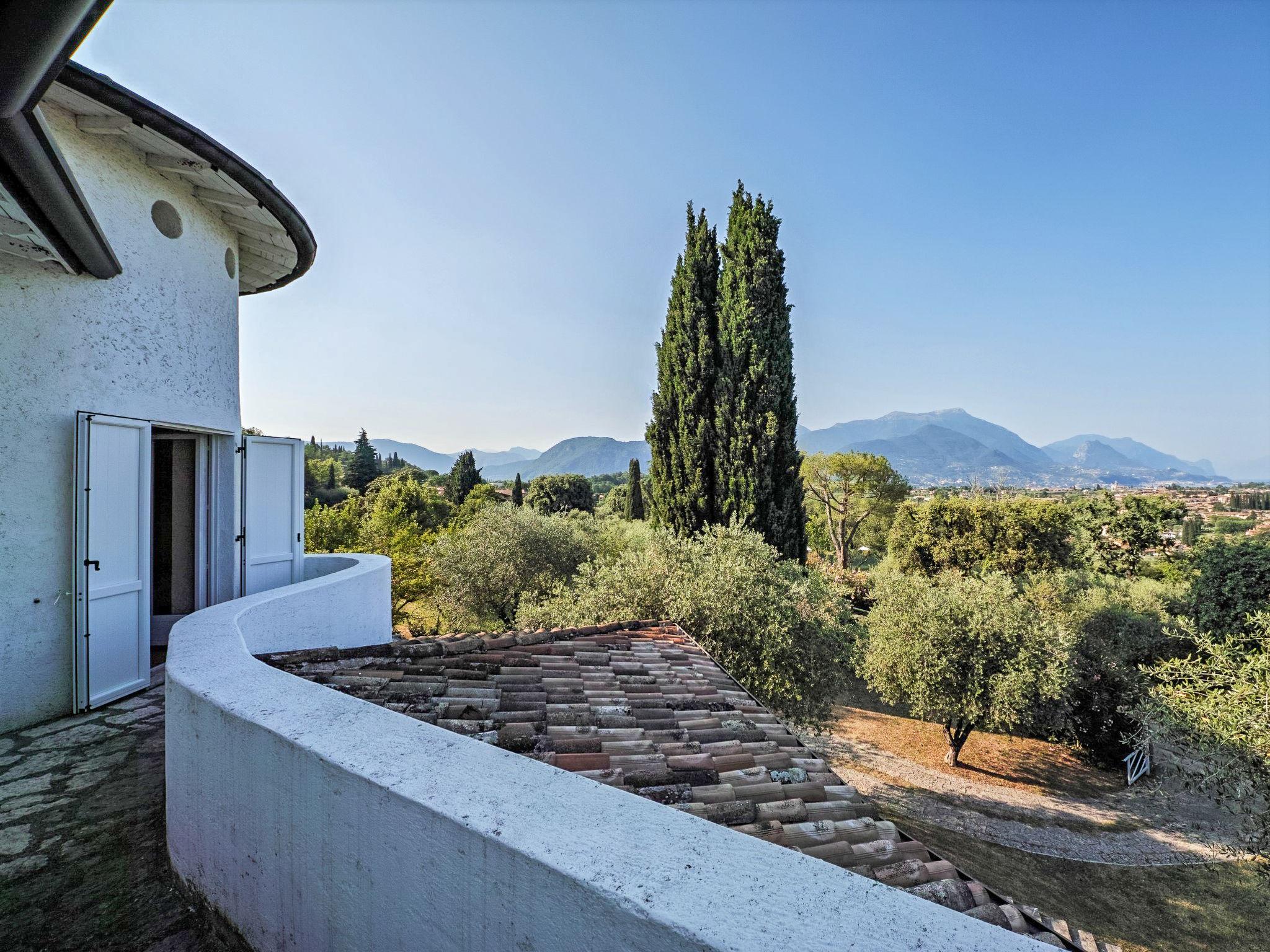 Foto 29 - Casa de 7 quartos em San Felice del Benaco com piscina privada e jardim