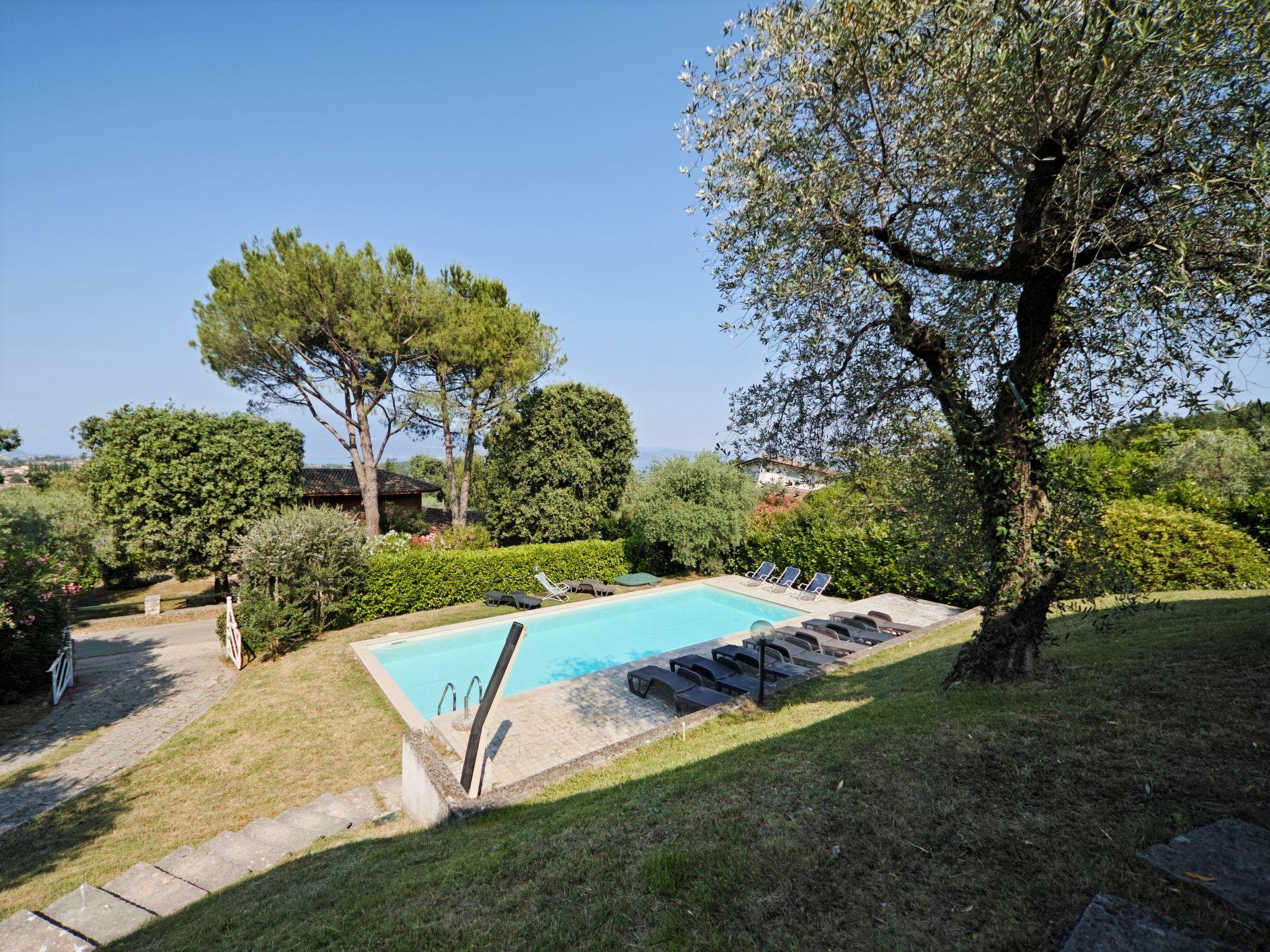 Foto 38 - Casa de 7 quartos em San Felice del Benaco com piscina privada e vista para a montanha