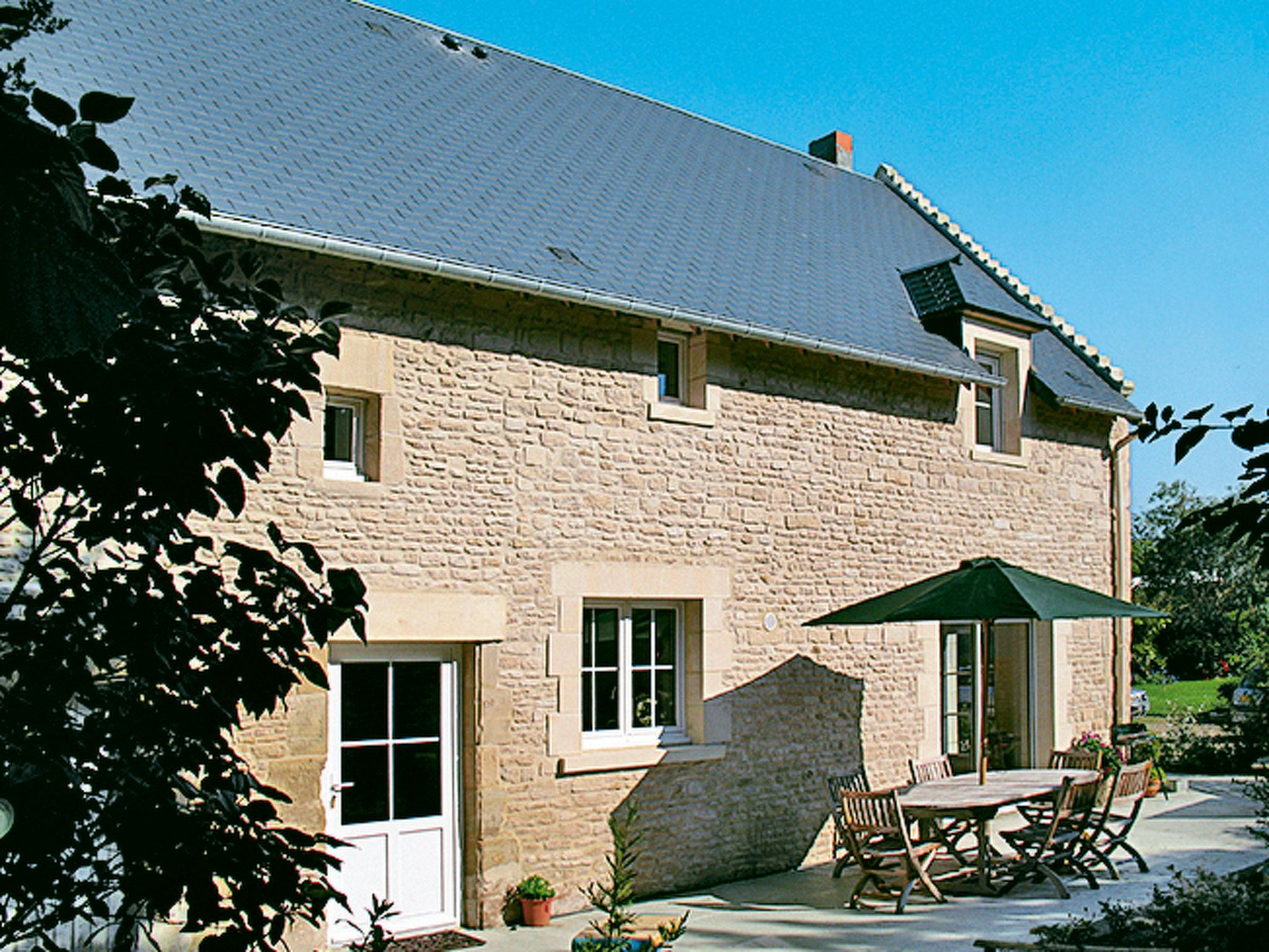 Photo 1 - Maison de 3 chambres à Cambes-en-Plaine avec jardin et vues à la mer