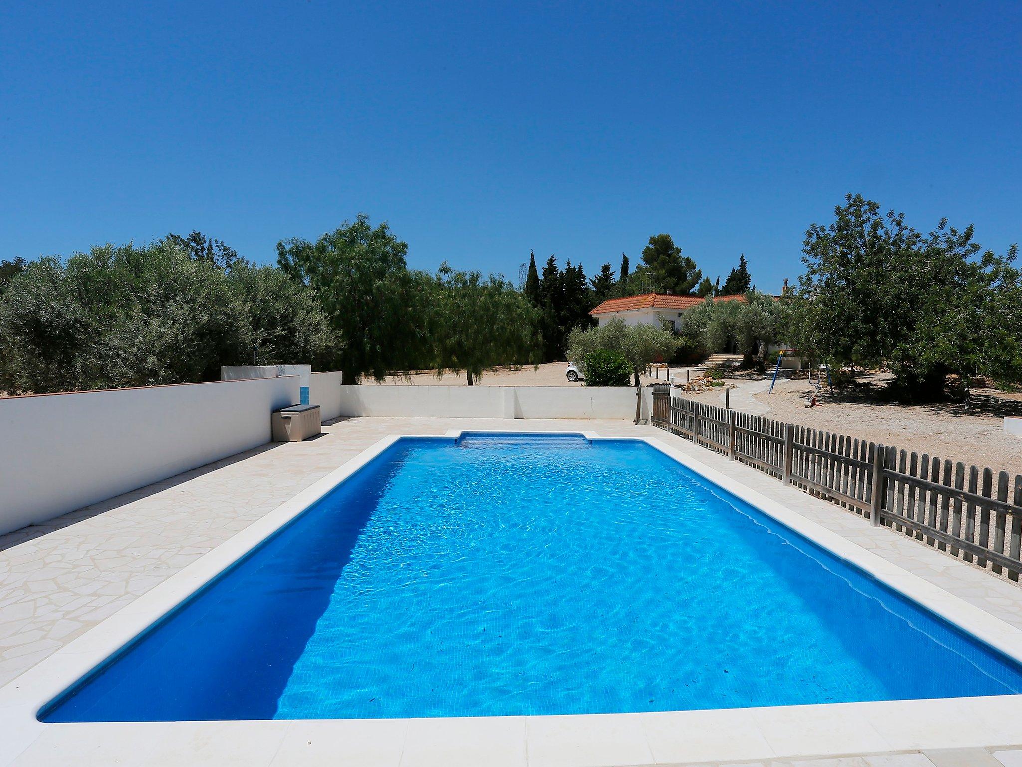 Foto 1 - Casa con 4 camere da letto a l'Ampolla con piscina privata e giardino