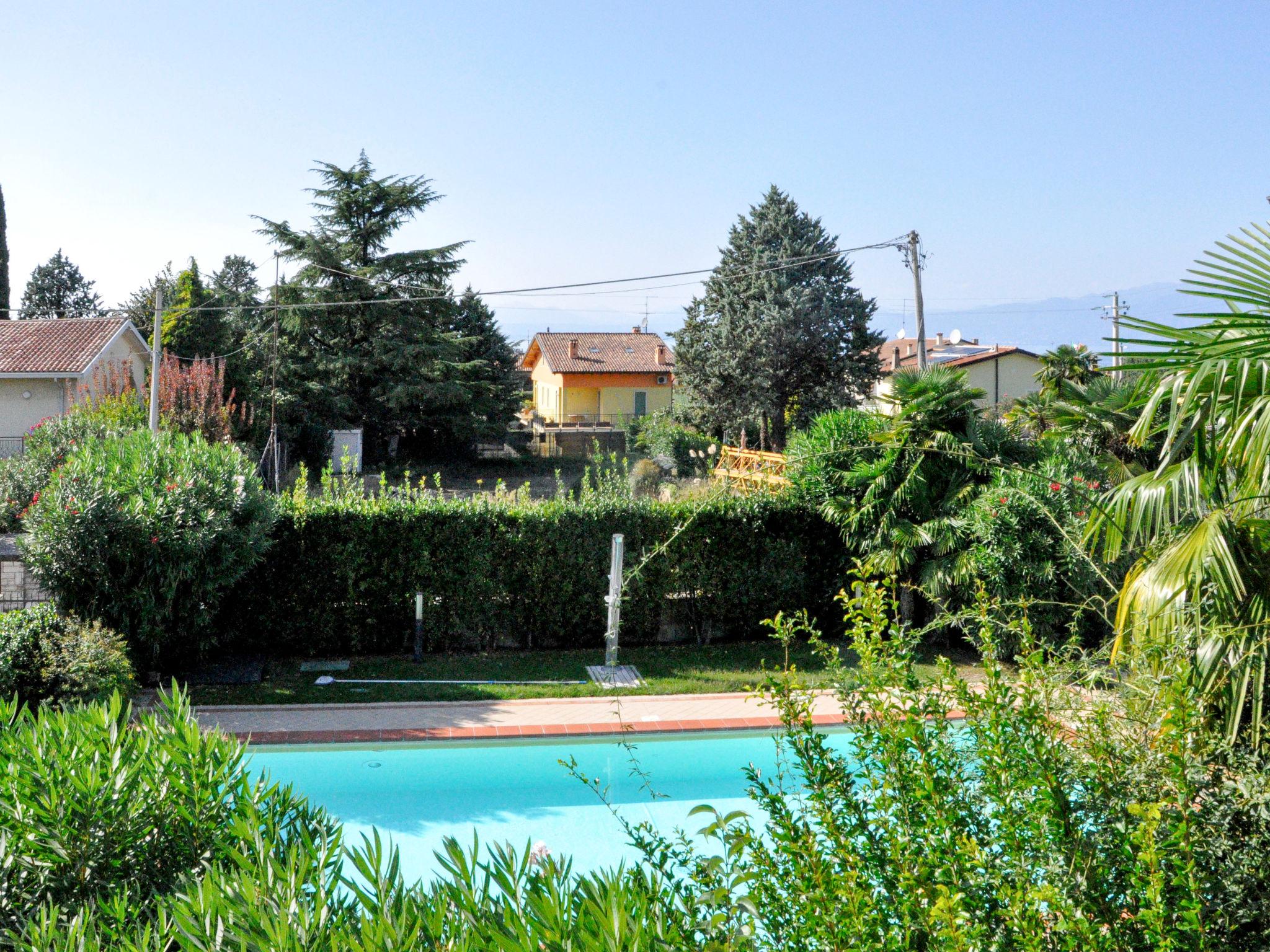 Foto 21 - Apartamento de 2 habitaciones en Lazise con piscina y vistas a la montaña