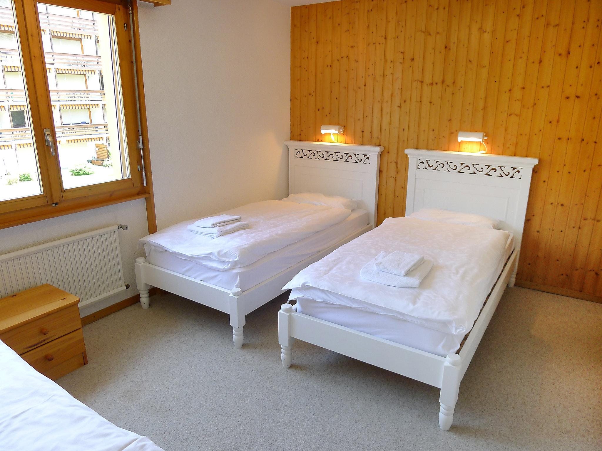 Foto 10 - Appartamento con 2 camere da letto a Ollon con giardino e vista sulle montagne
