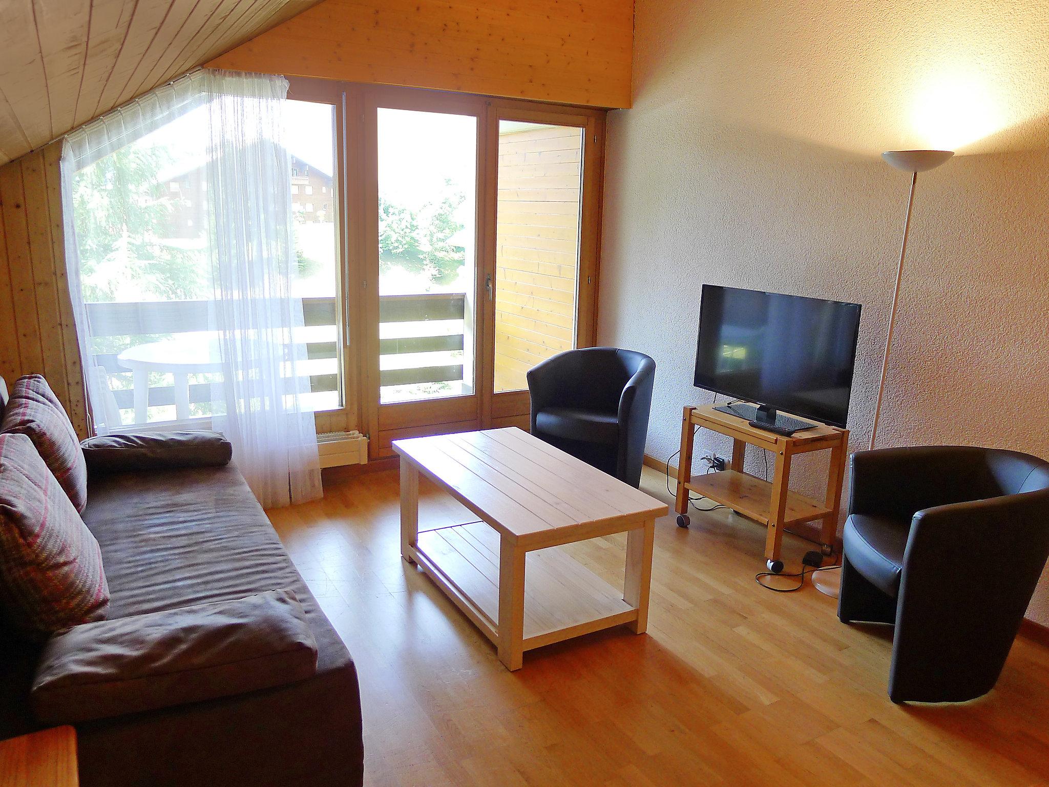 Foto 3 - Appartamento con 2 camere da letto a Ollon con giardino e vista sulle montagne