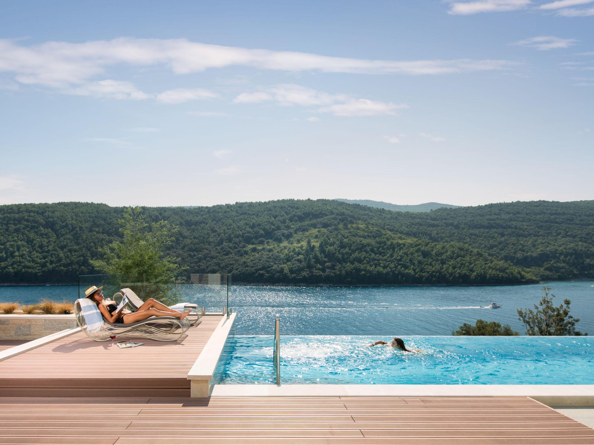 Photo 7 - Maison de 5 chambres à Labin avec piscine privée et vues à la mer