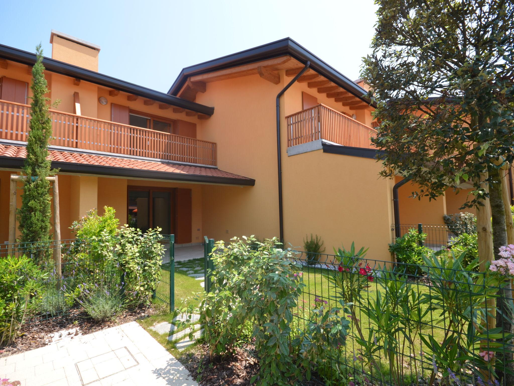 Photo 26 - Maison de 2 chambres à Lignano Sabbiadoro avec piscine et vues à la mer