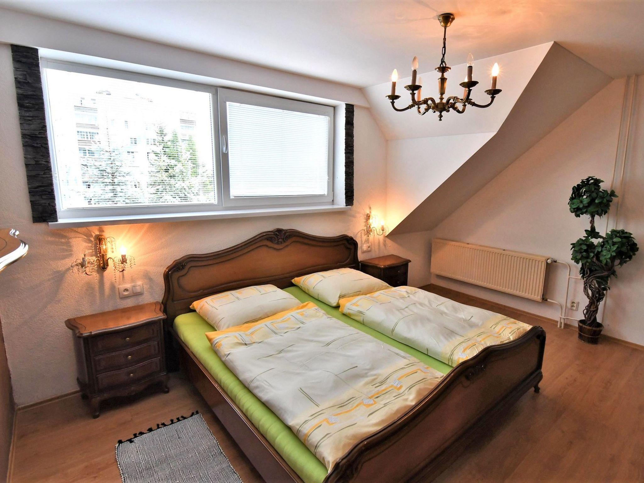 Foto 17 - Appartamento con 3 camere da letto a Štrba con giardino