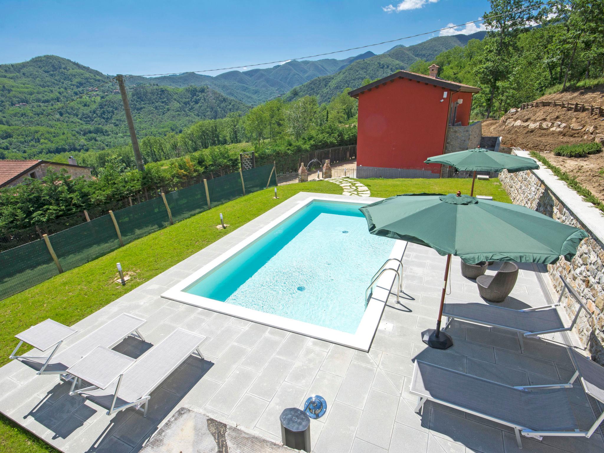 Foto 16 - Casa a Tresana con piscina e giardino