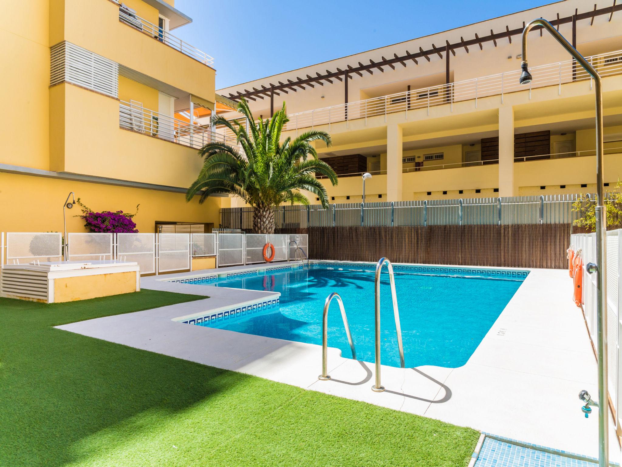 Photo 1 - Appartement de 2 chambres à Isla Cristina avec piscine et vues à la mer