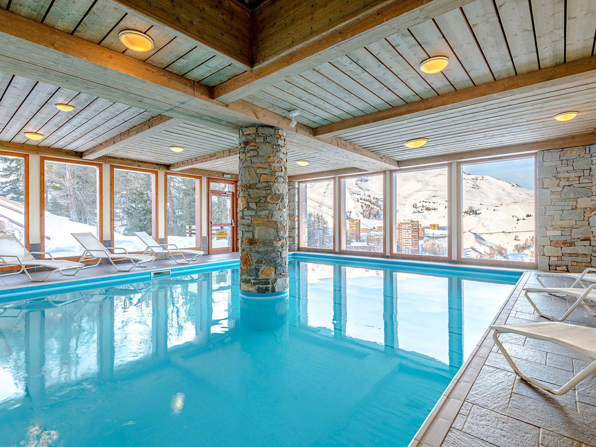 Foto 15 - Appartamento con 2 camere da letto a La Plagne Tarentaise con piscina e vista sulle montagne