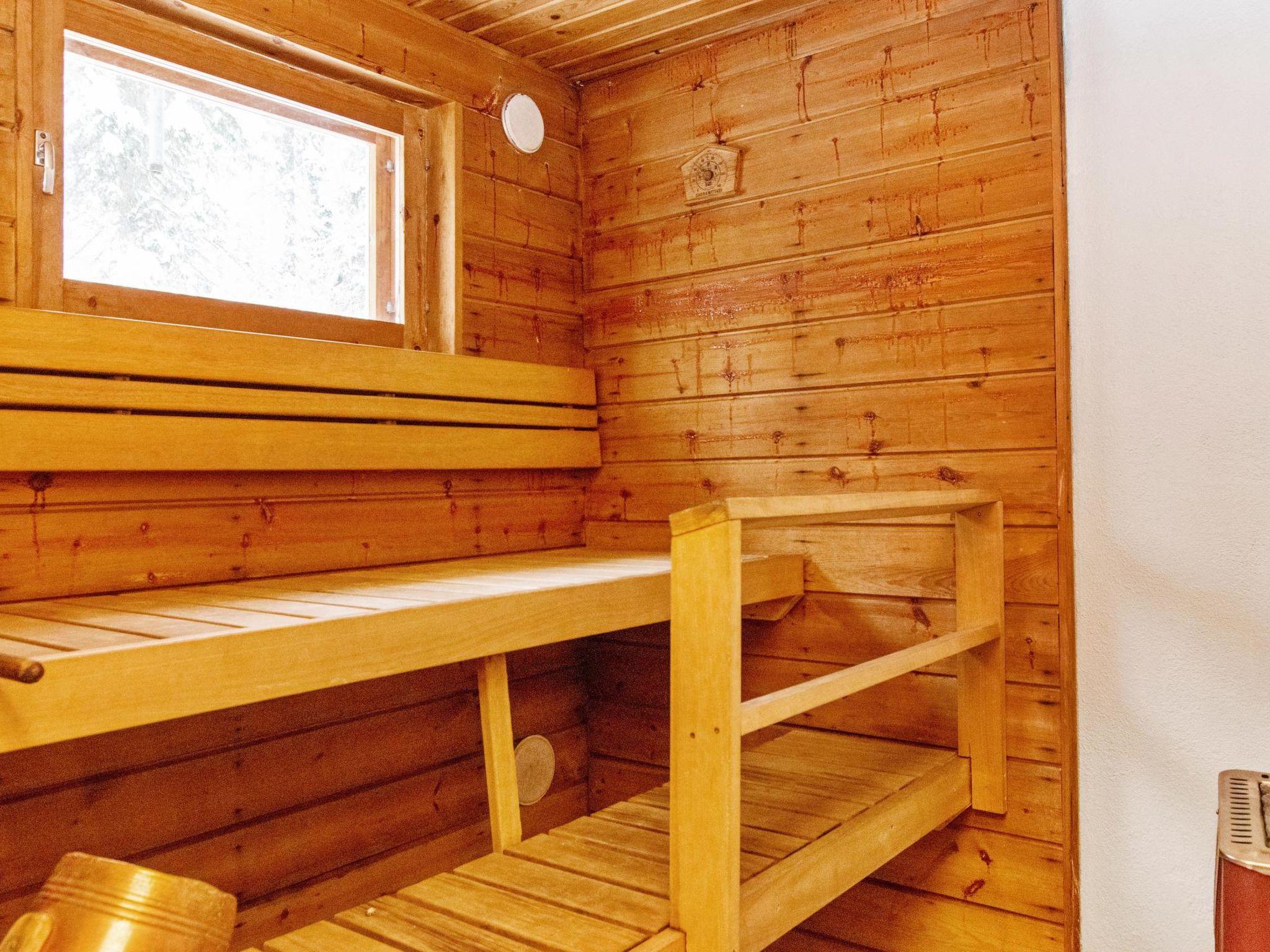 Foto 10 - Casa de 2 habitaciones en Puolanka con sauna y vistas a la montaña