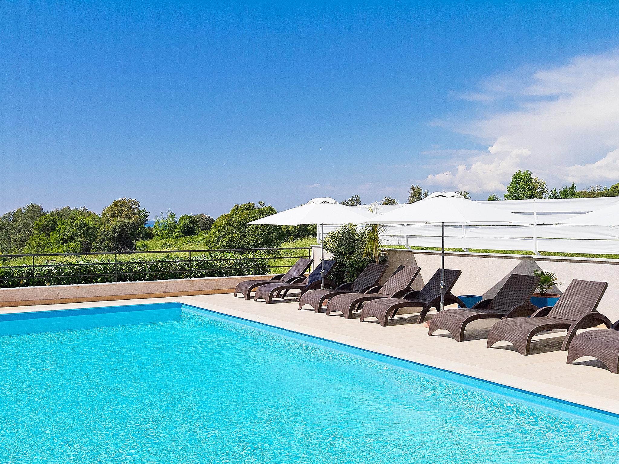 Photo 4 - Maison de 1 chambre à Pula avec piscine et jardin