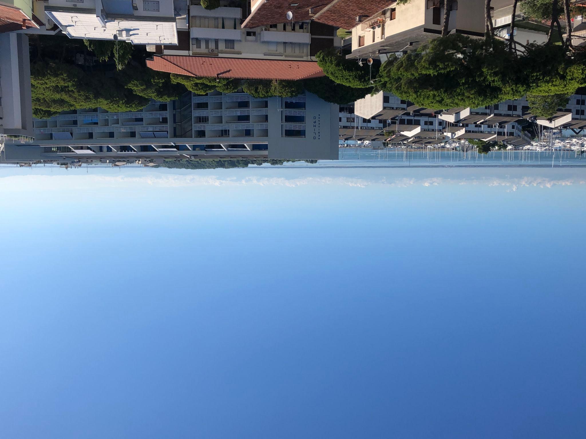 Foto 18 - Apartamento en Lignano Sabbiadoro con piscina y vistas al mar