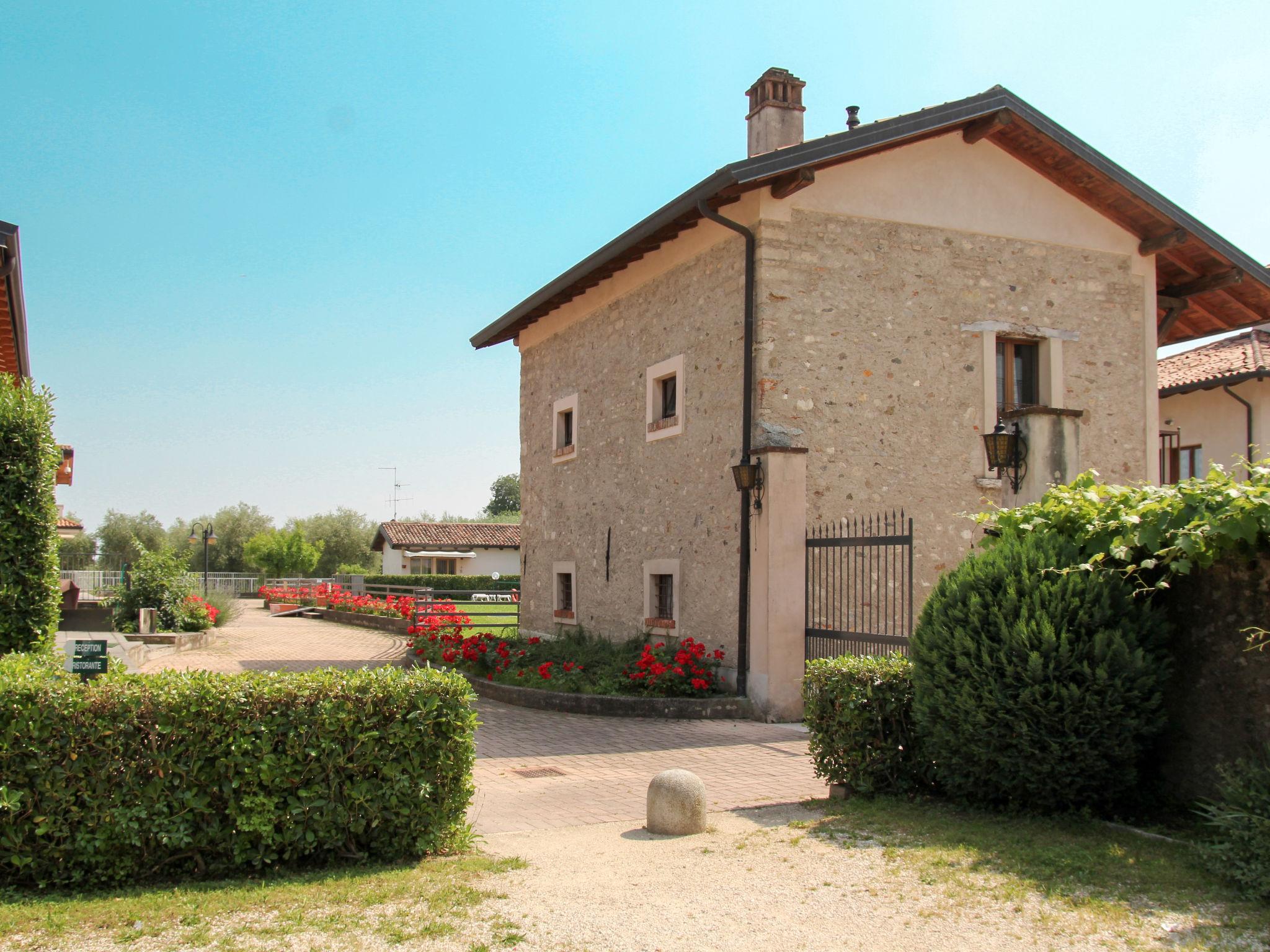 Foto 11 - Casa con 2 camere da letto a Salò con piscina e giardino