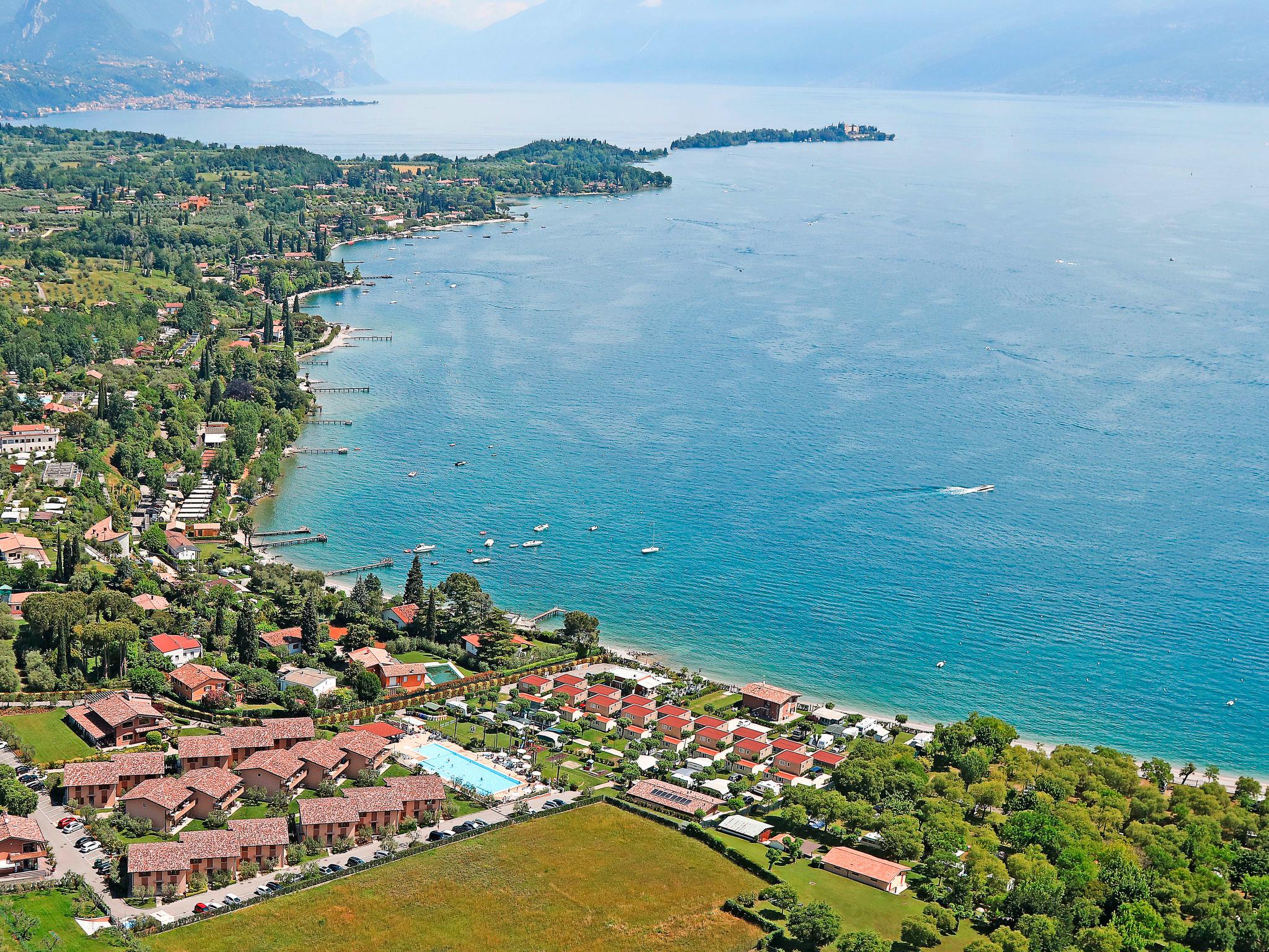 Foto 2 - Apartamento de 1 habitación en Manerba del Garda con piscina y vistas a la montaña