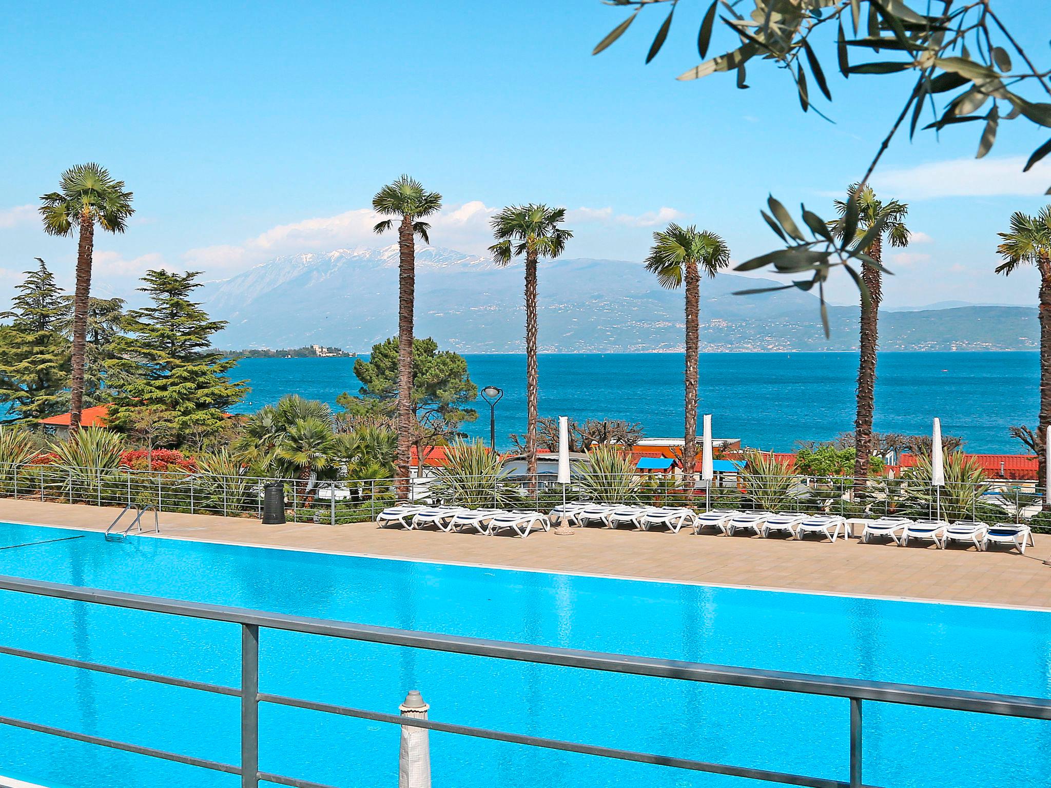 Foto 1 - Casa de 2 habitaciones en Manerba del Garda con piscina y vistas a la montaña