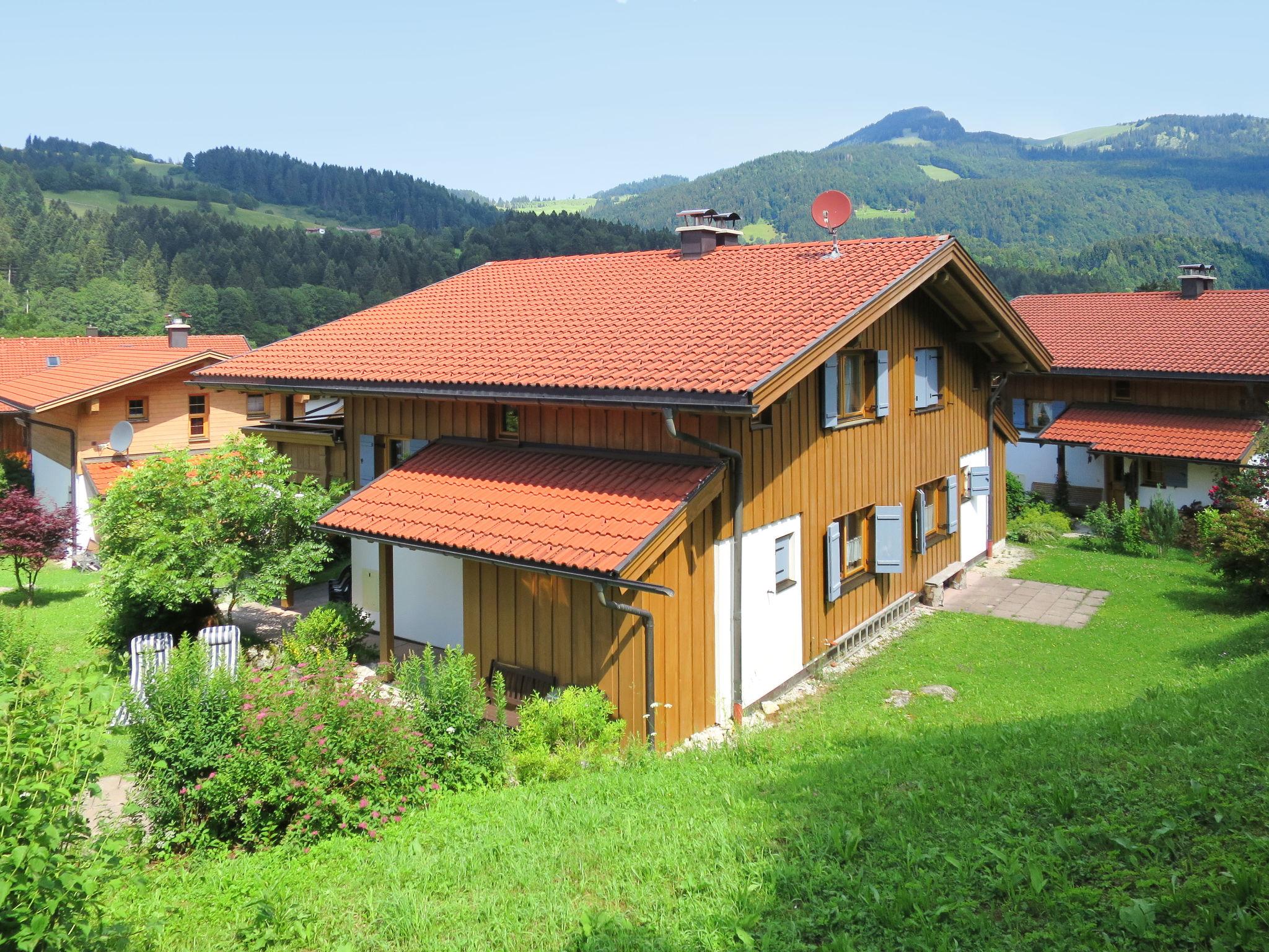 Foto 1 - Casa de 2 habitaciones en Aschau i. Chiemgau con terraza y vistas a la montaña
