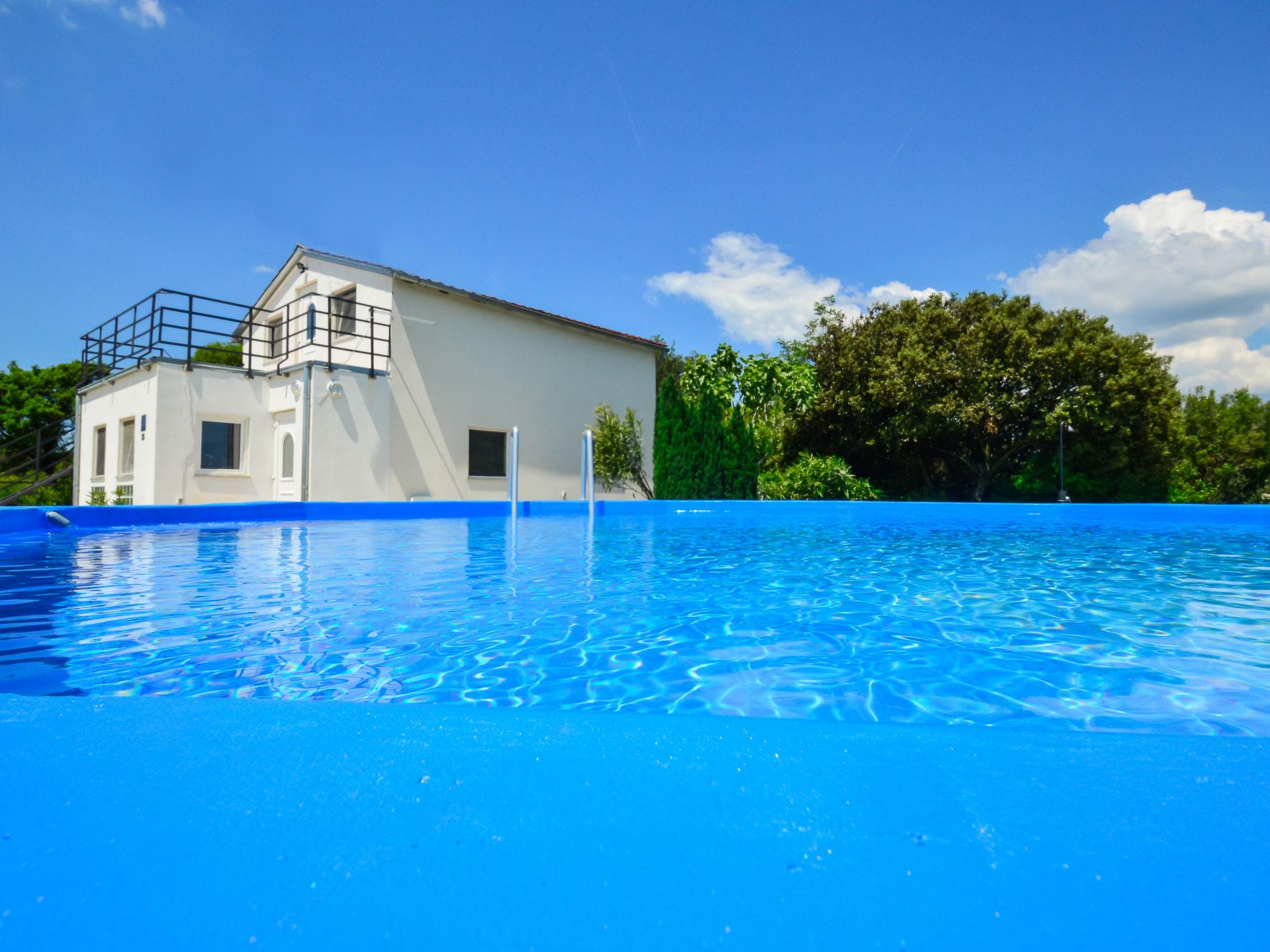 Photo 15 - Maison de 3 chambres à Pula avec piscine privée et vues à la mer